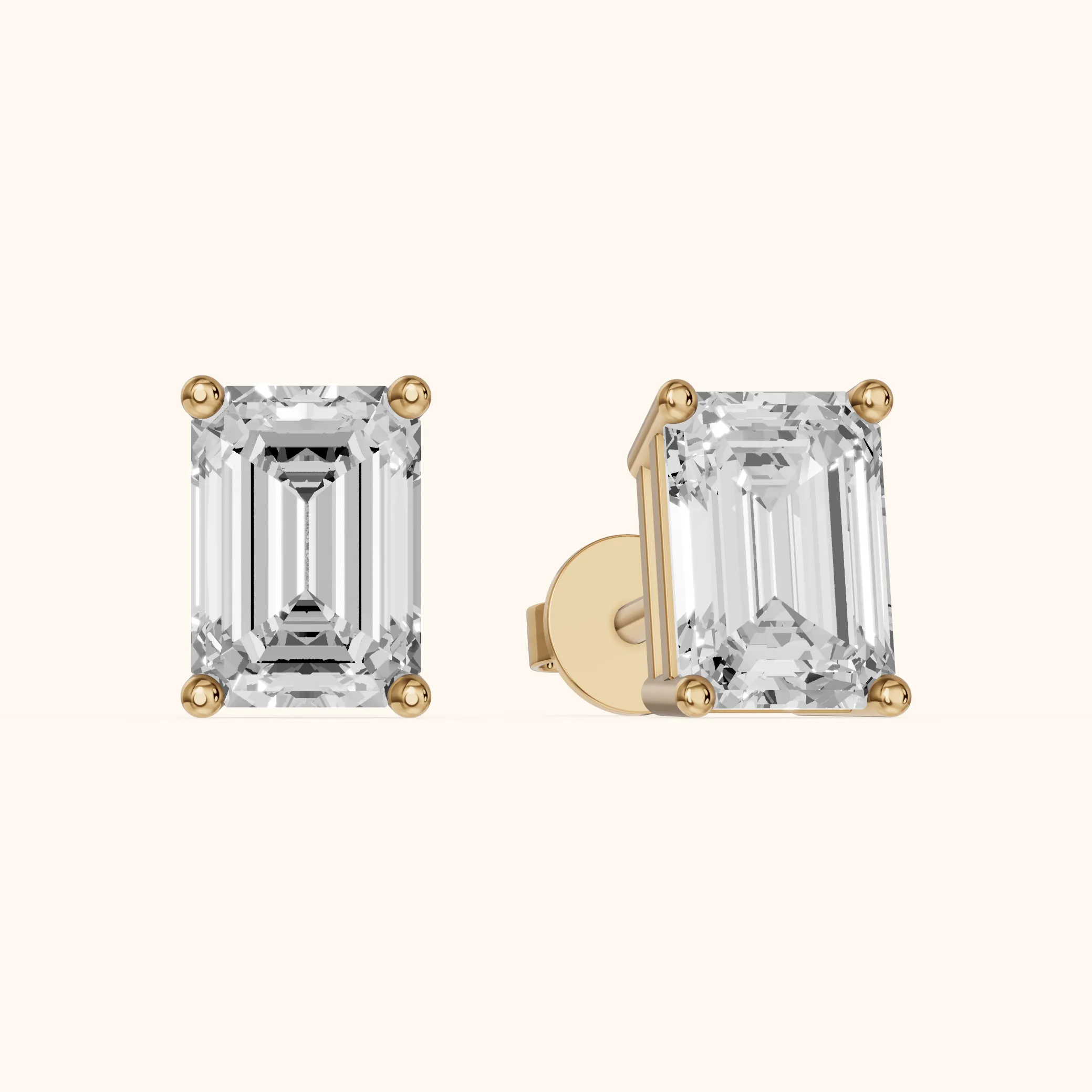 Four Prong Emerald Diamond Stud Earrings in Yellow Gold — view 1