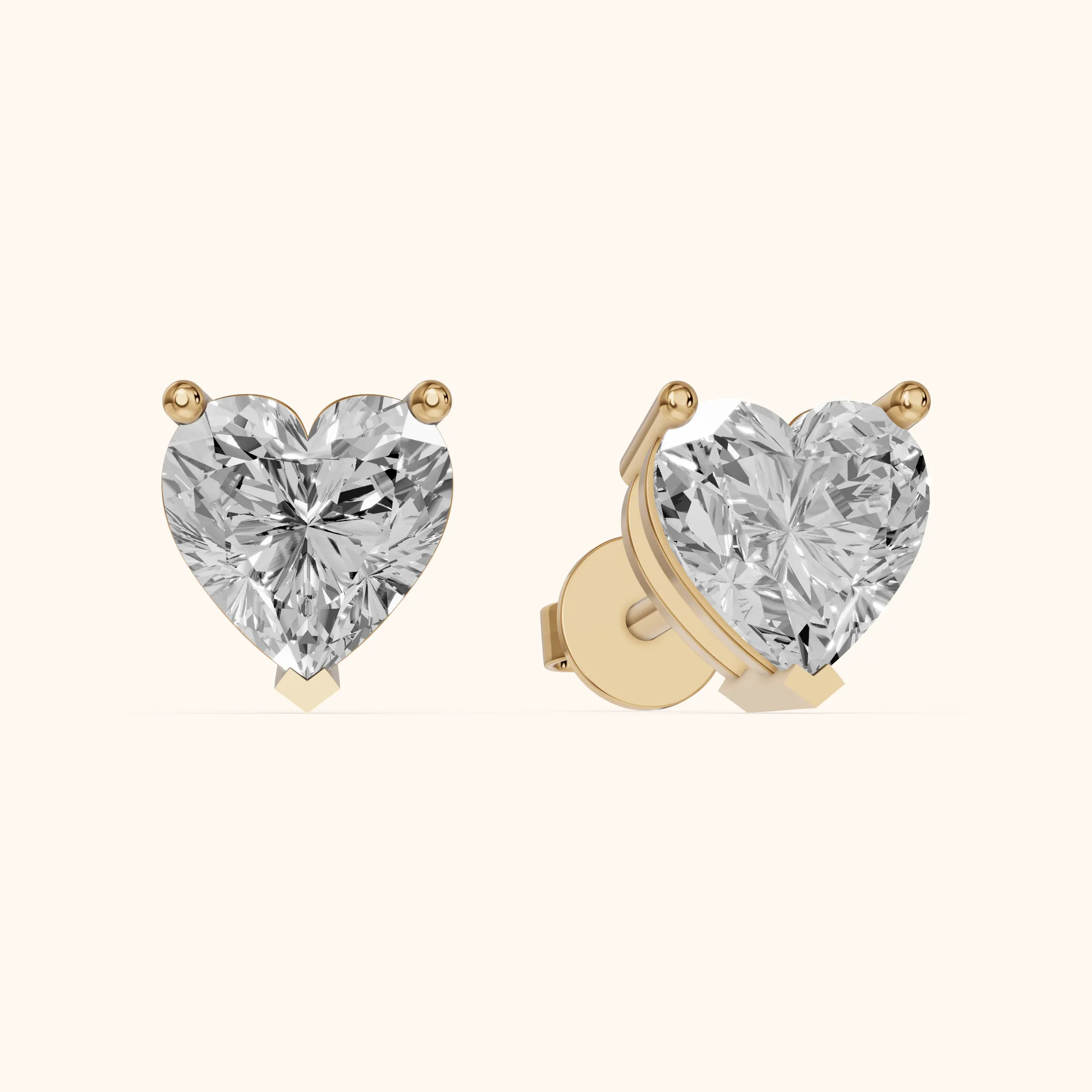 Four Prong Heart Diamond Stud Earrings in Yellow Gold — view 1