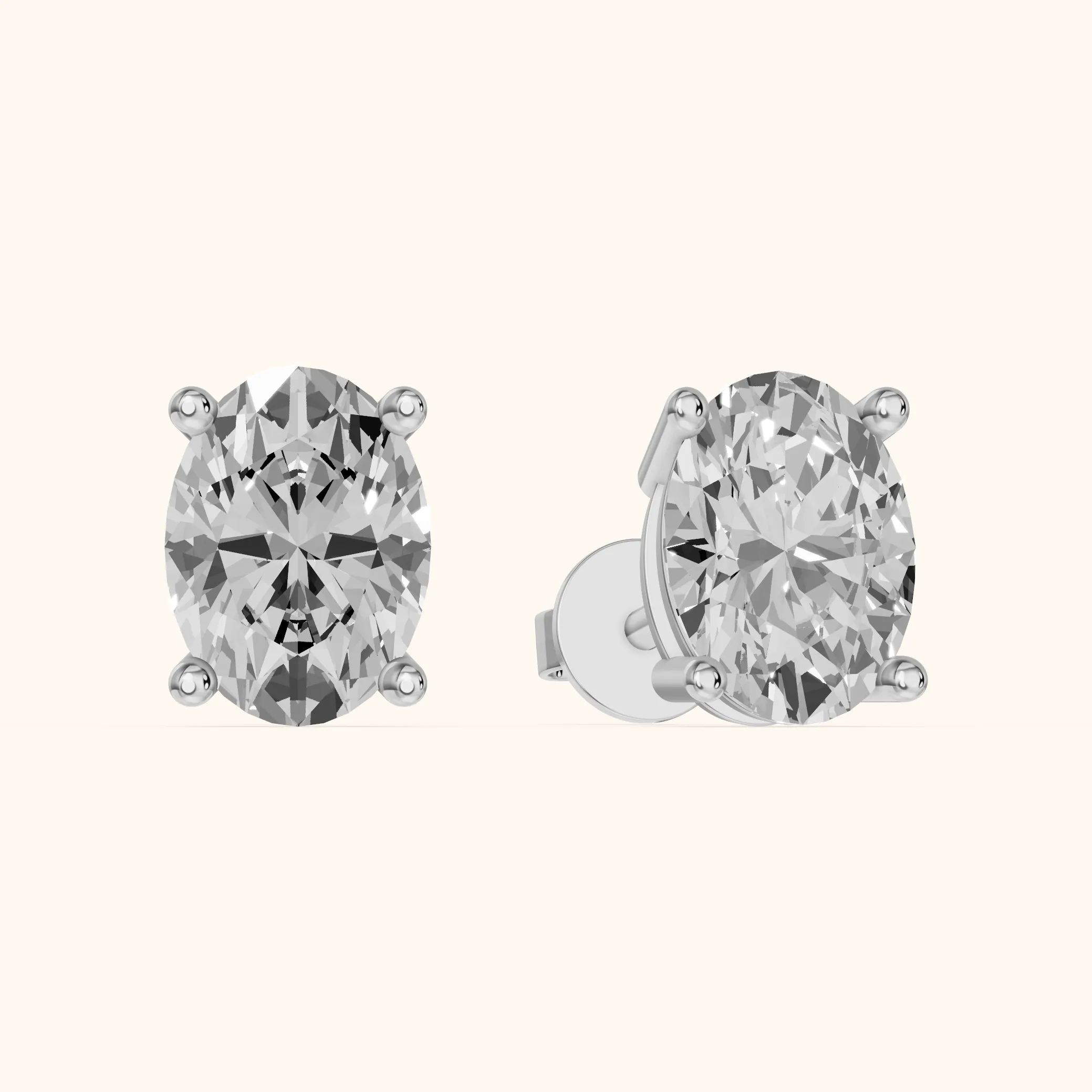Four Prong Oval Diamond Stud Earrings in Platinum — view 1