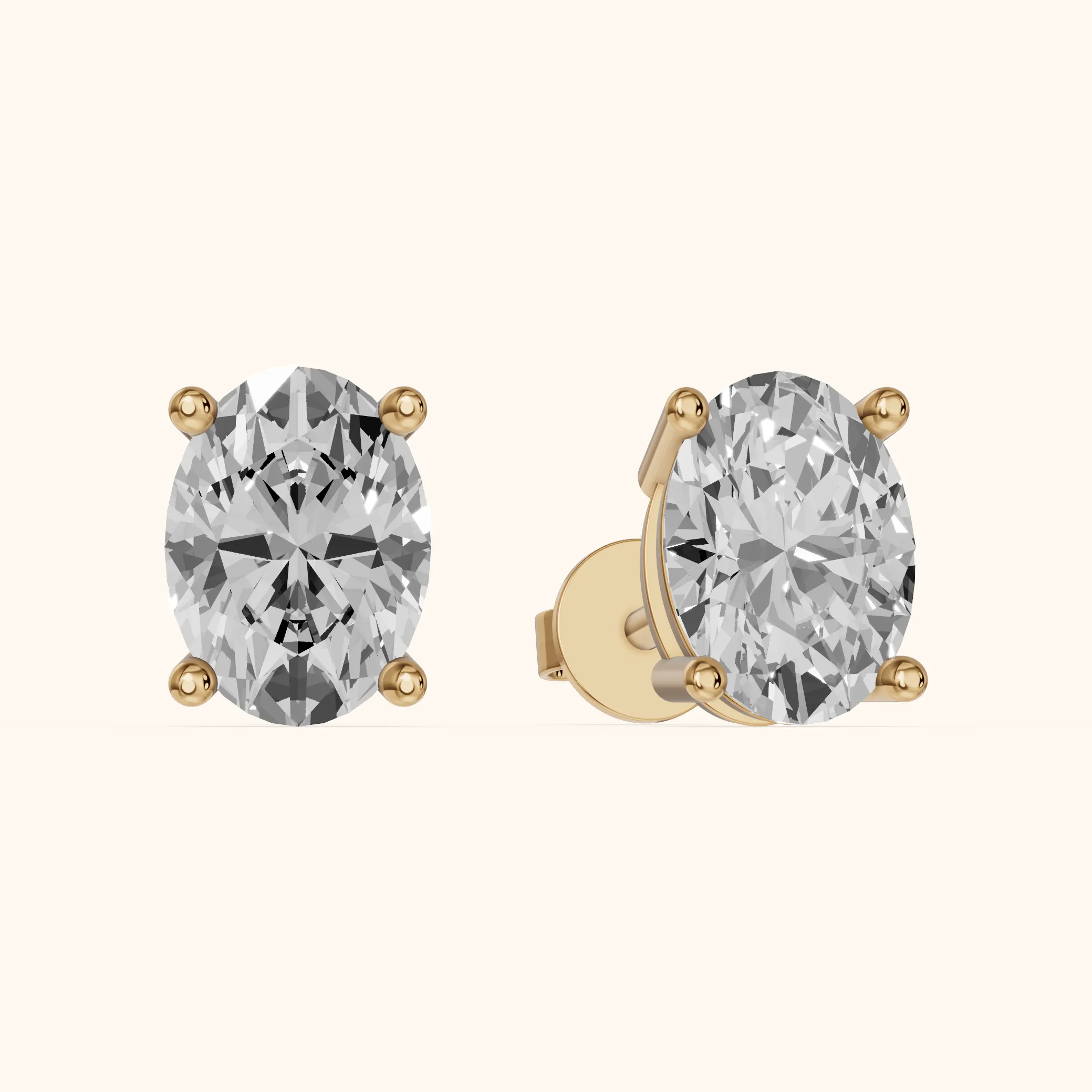 Four Prong Oval Diamond Stud Earrings in Yellow Gold — view 1
