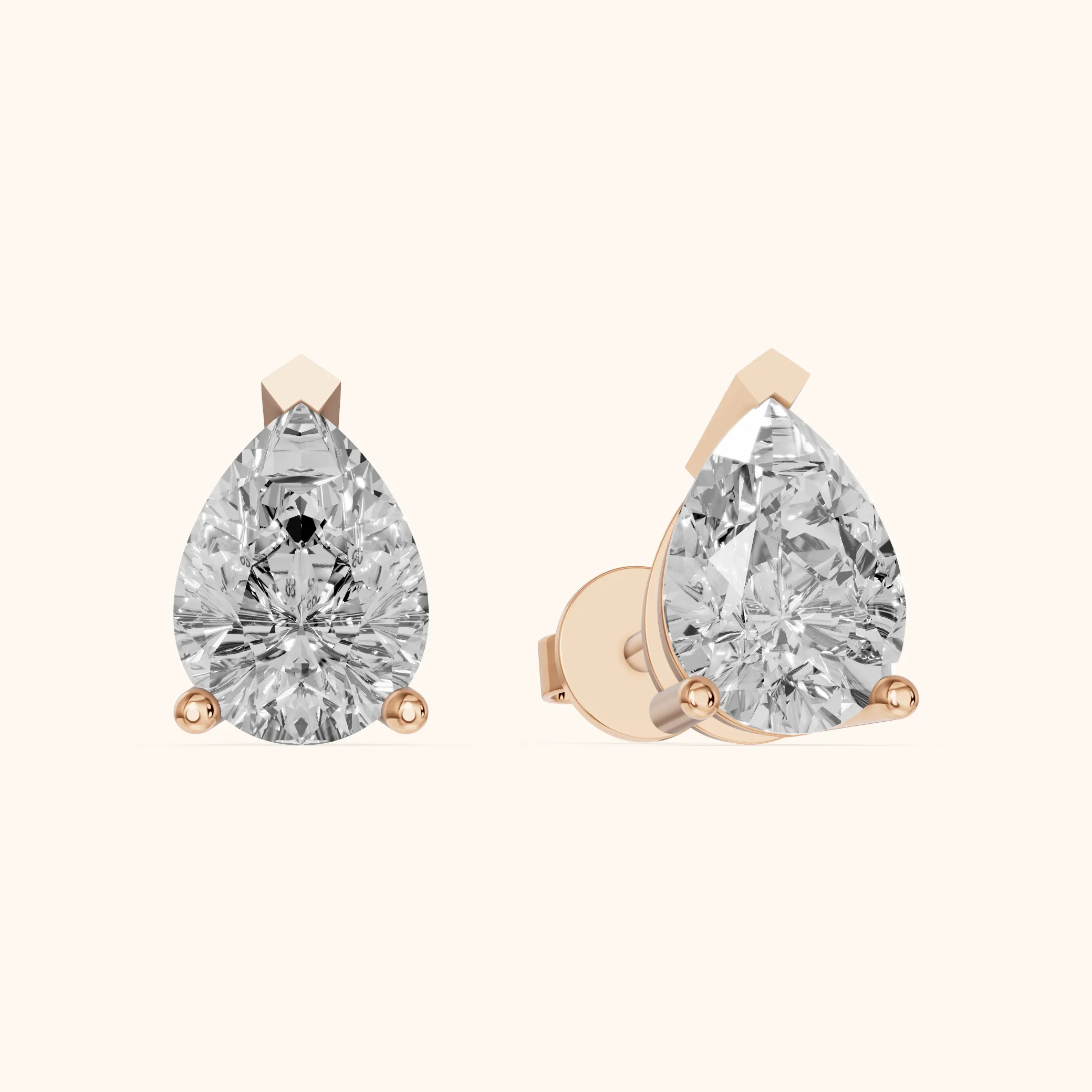 Four Prong Pear Diamond Stud Earrings in Rose Gold — view 1