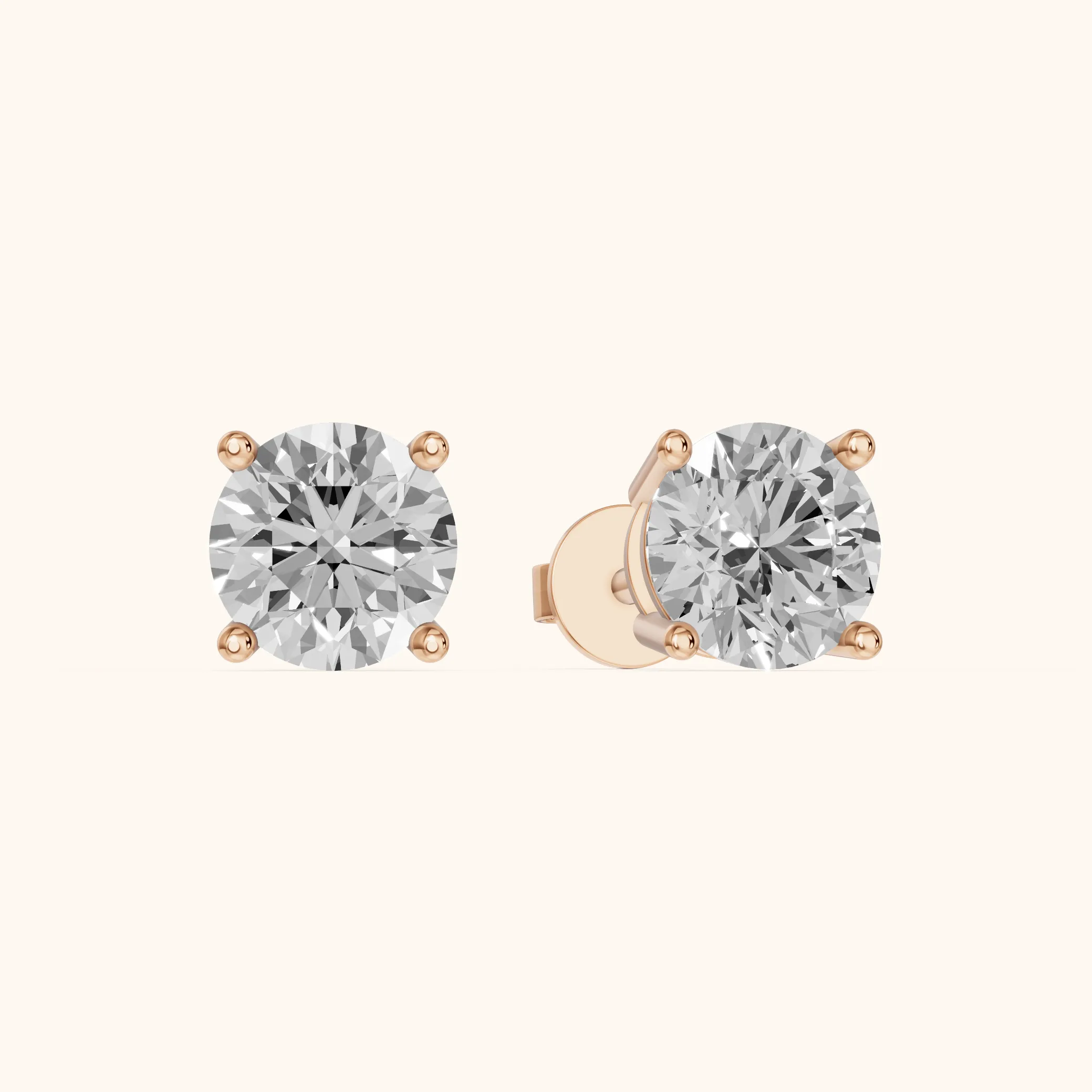 Four Prong Round Diamond Stud Earrings in Rose Gold — view 1