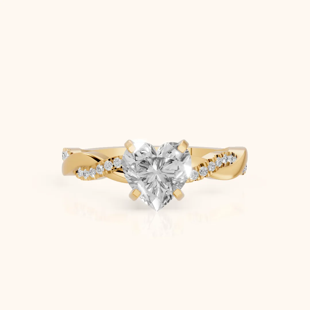 Bague de fiançailles en or jaune avec cœur diamant et pierres latérales torsadées