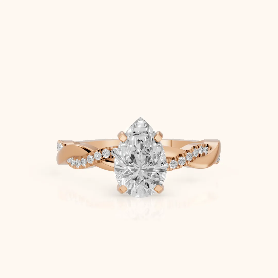 Bague de fiançailles en or rose avec diamant poire et pierre latérale torsadée