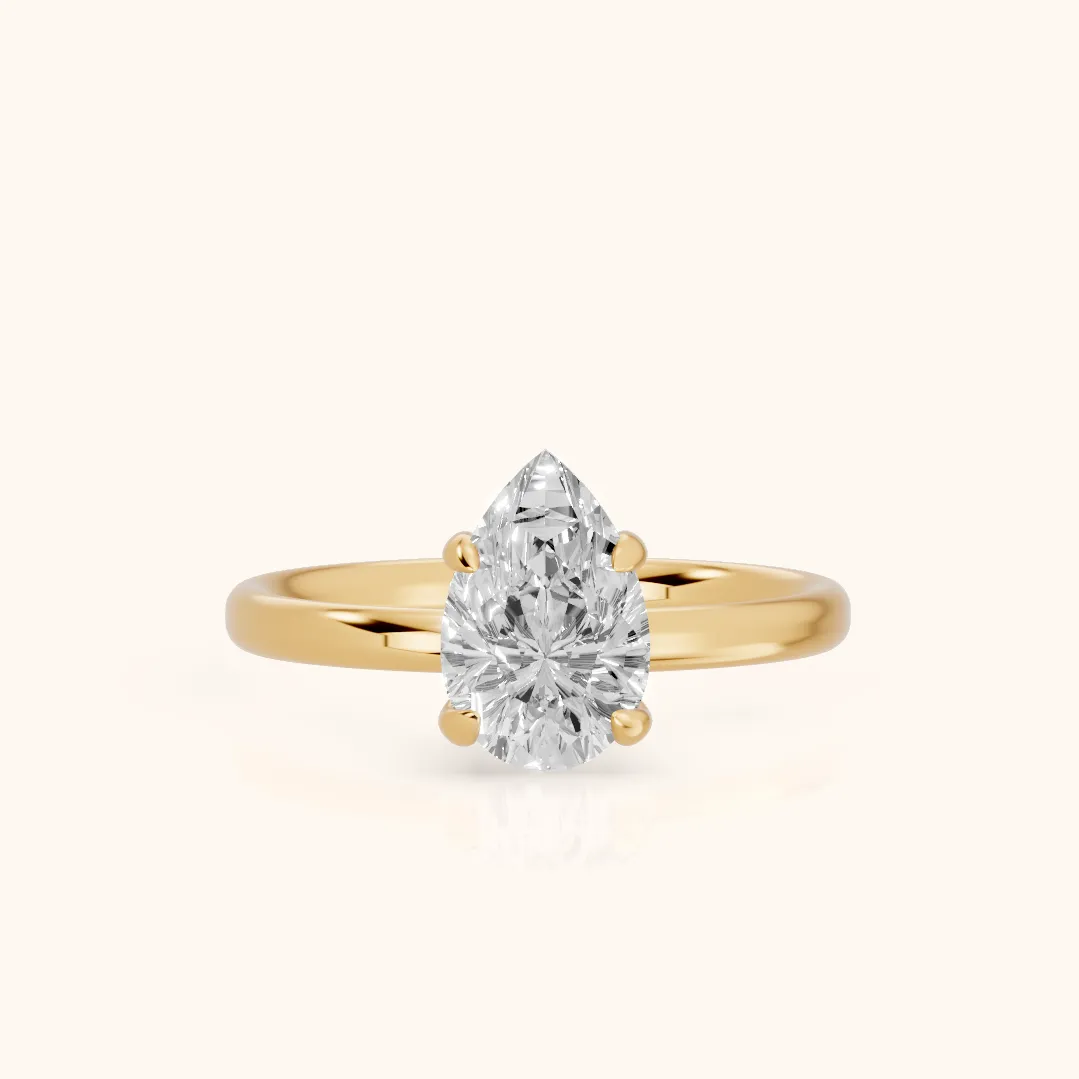 Charlotte Charm Solitaire Pear Diamond Engagement Ring in Yellow Gold