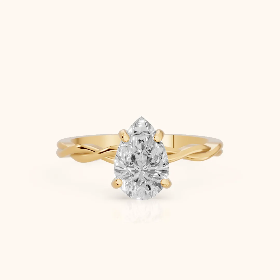 Iris Twist Pear Diamond Engagement Ring in Yellow Gold