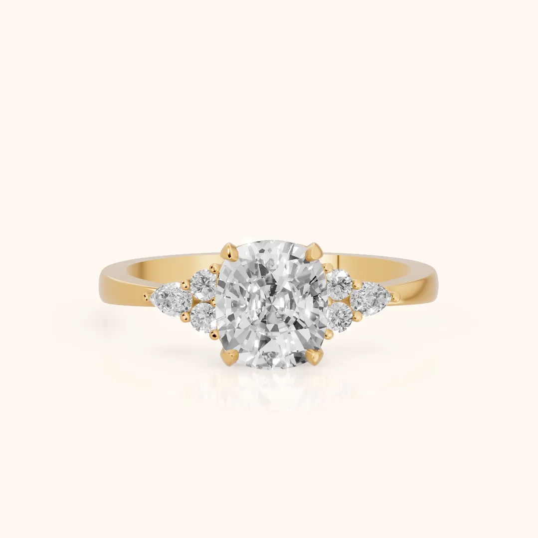 Amelia Three Stone Cushion Diamond Engagement Ring in Yellow Gold