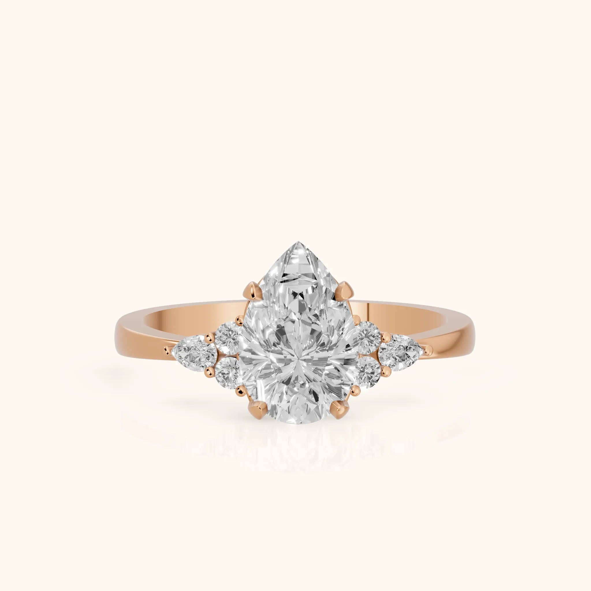 Amelia Three Stone Pear Diamond Engagement Ring in Rose Gold — view 1
