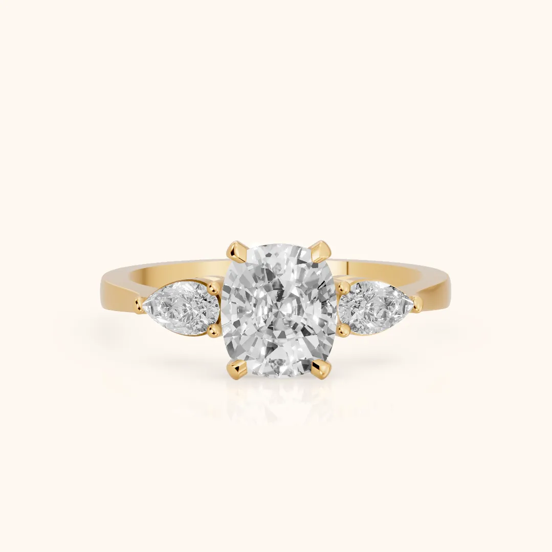 Grace Three Stone Cushion Diamond Engagement Ring in Yellow Gold