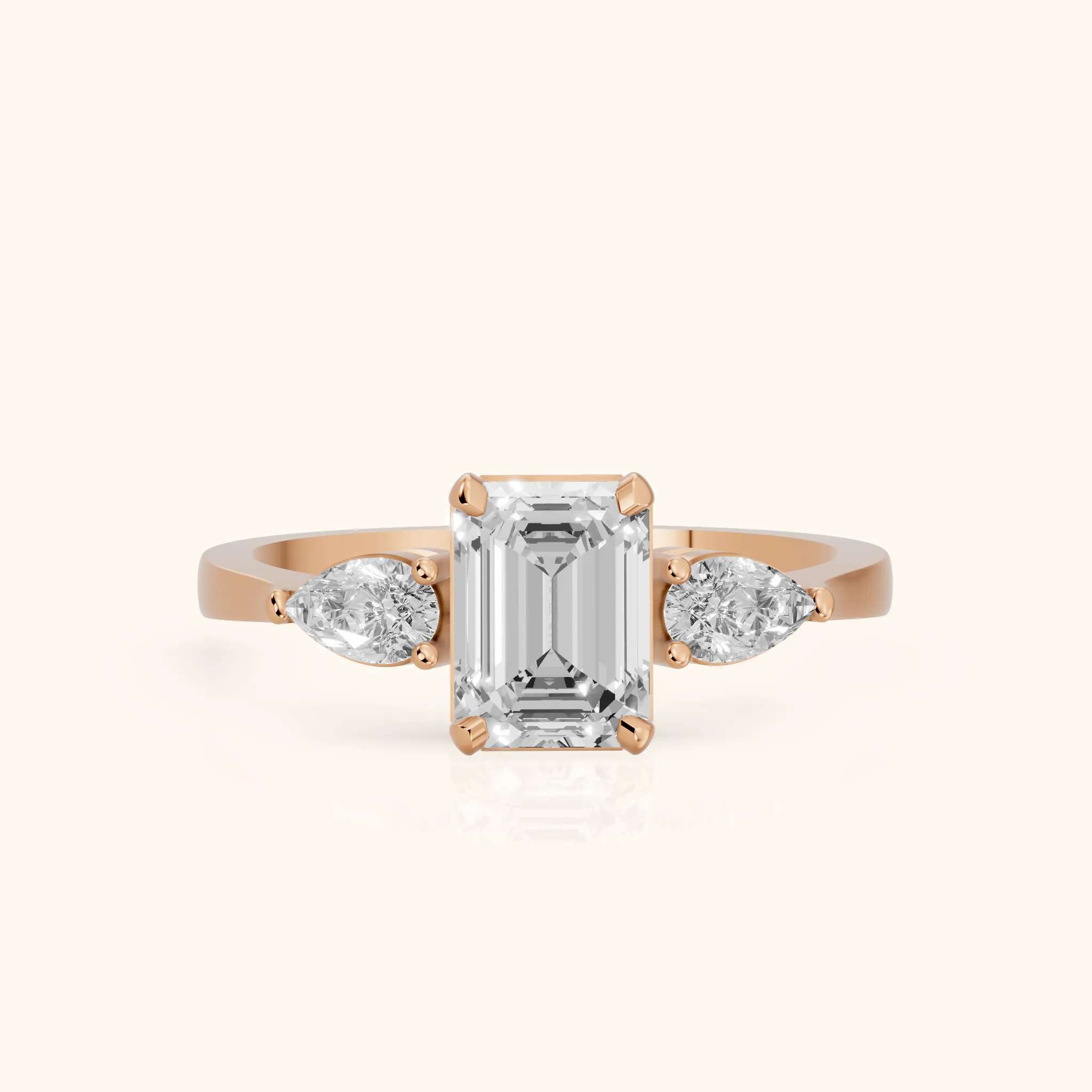 Grace Three Stone Emerald Diamond Engagement Ring in Rose Gold — view 1