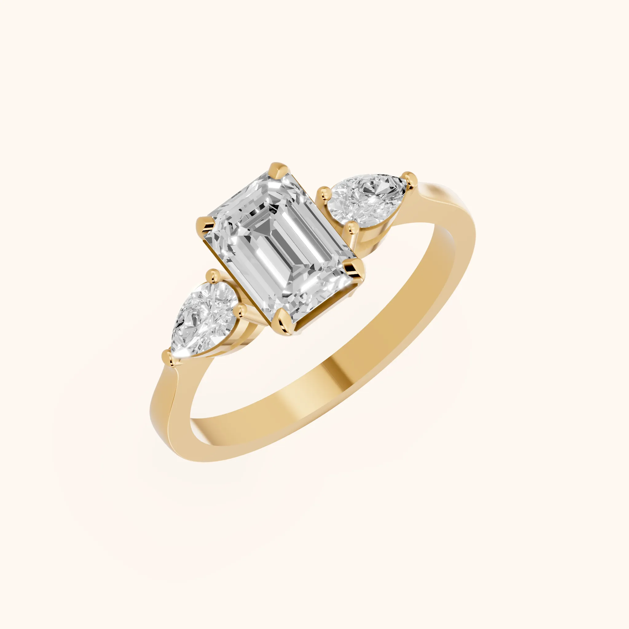 Grace Three Stone Emerald Diamond Engagement Ring in Yellow Gold