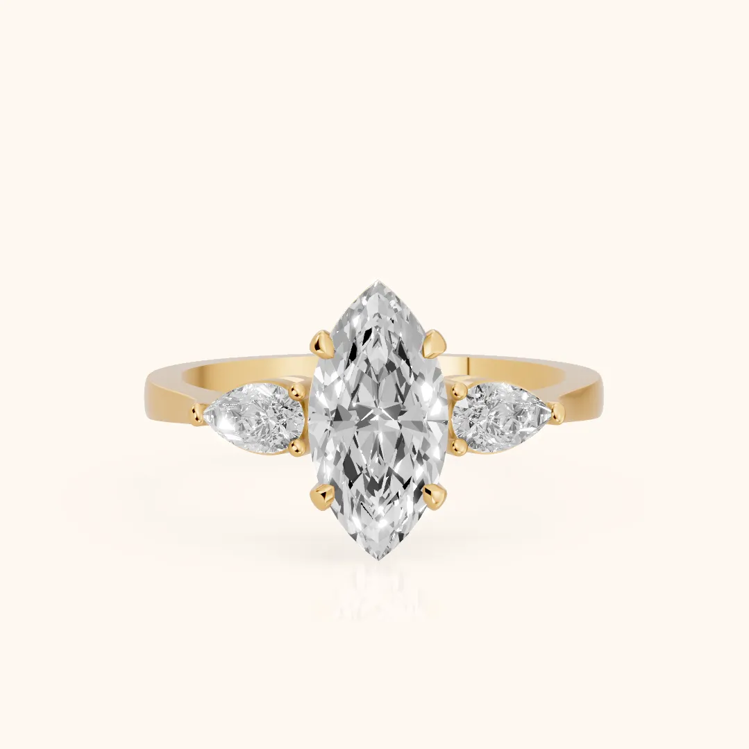 Grace Three Stone Marquise Diamond Engagement Ring in Yellow Gold