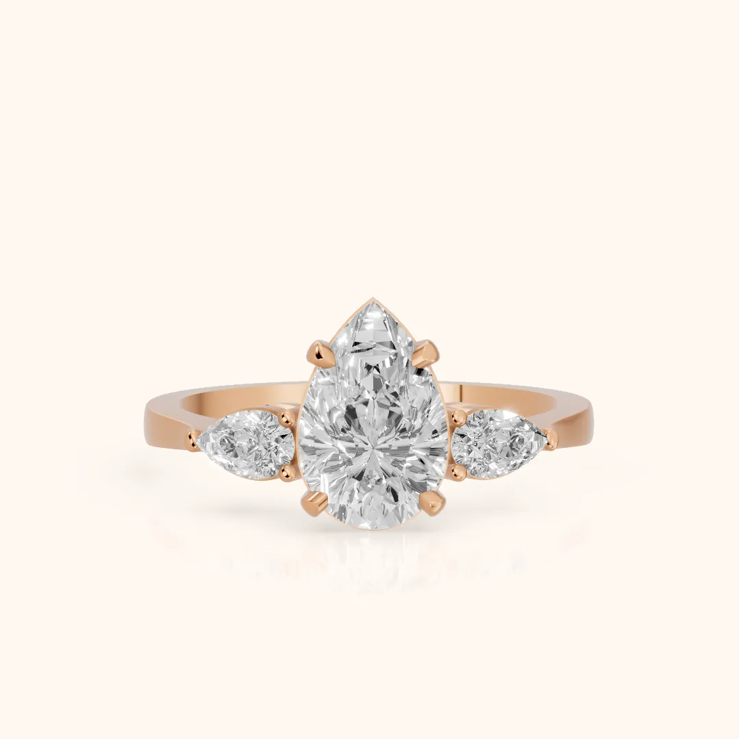 Bague de fiançailles Grace trois pierres diamant poire en or rose