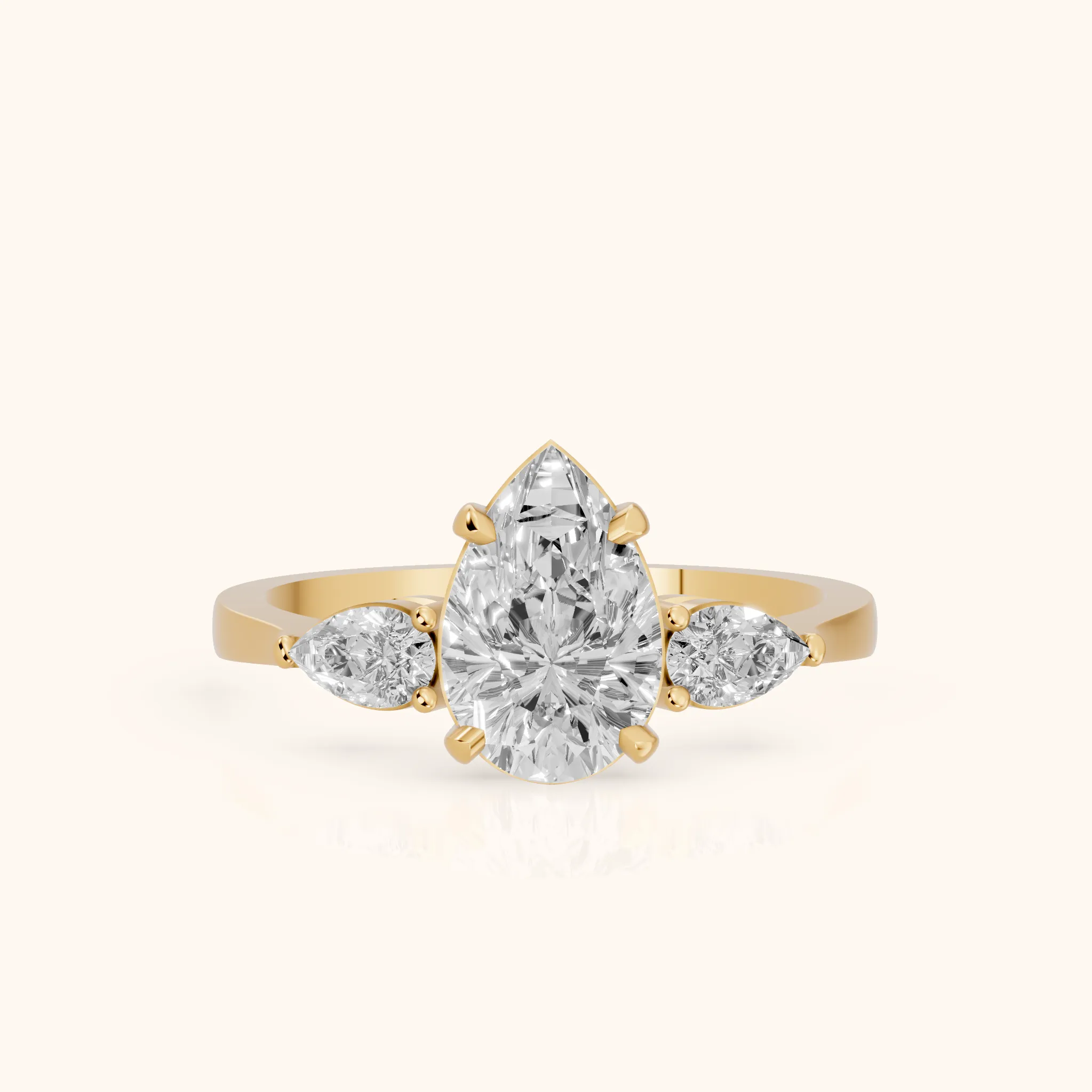 Grace Three Stone Pear Diamond Engagement Ring in Yellow Gold — view 1
