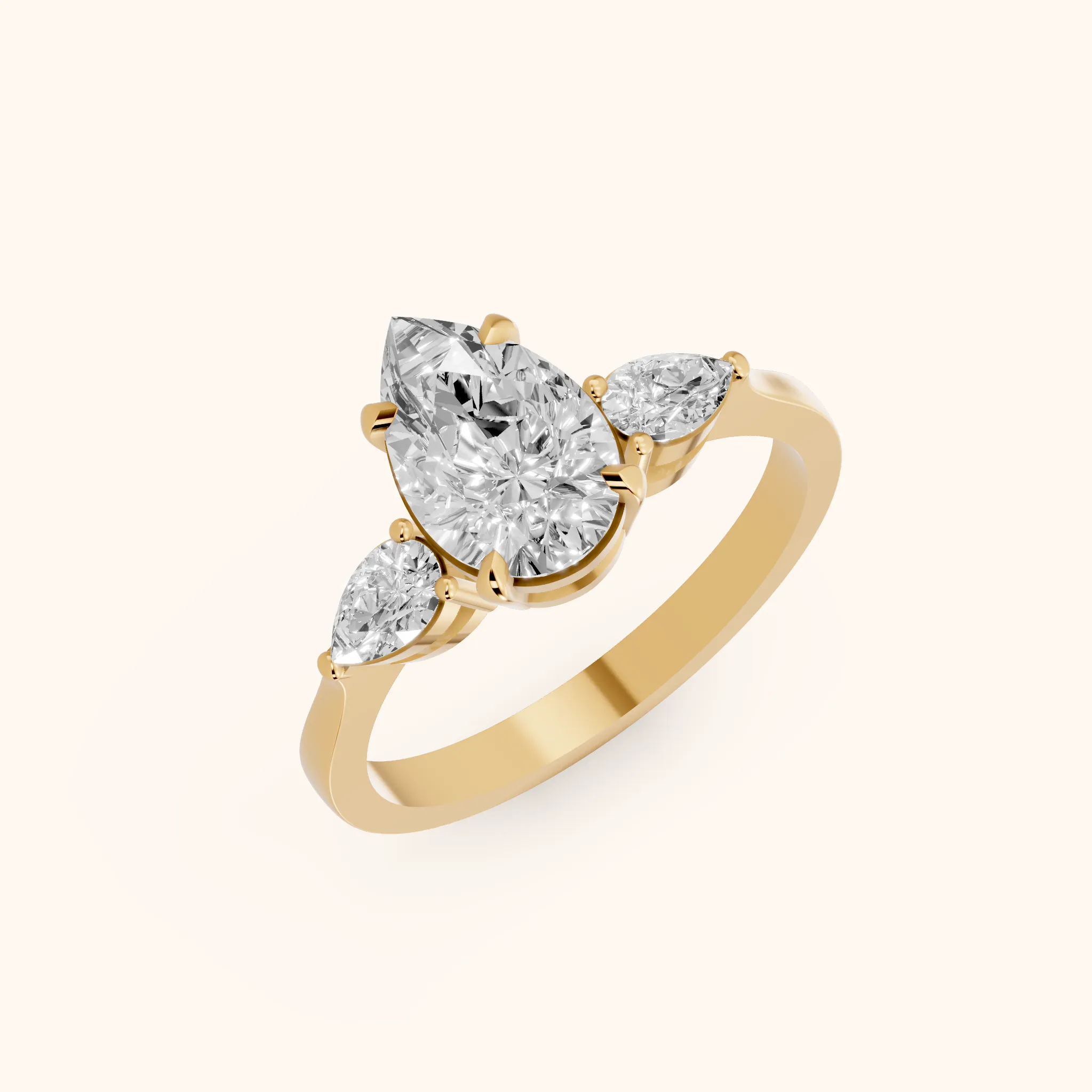 Grace Three Stone Pear Diamond Engagement Ring in Yellow Gold