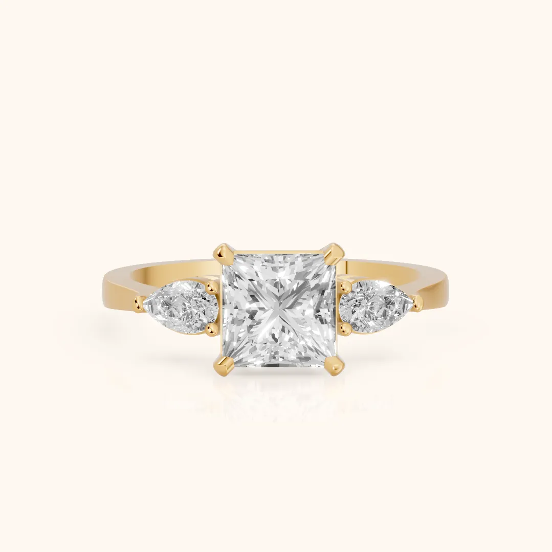 Grace Three Stone Princess Diamond Engagement Ring in Yellow Gold
