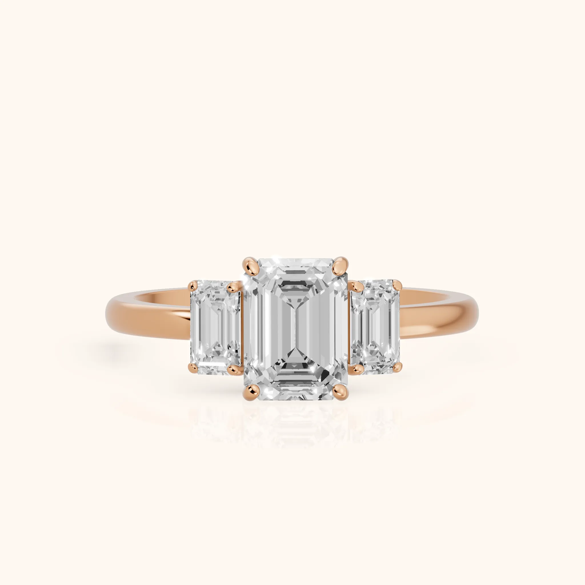 Marian Three-Stone Hidden Halo Emerald Diamond Engagement Ring in Rose Gold — view 1