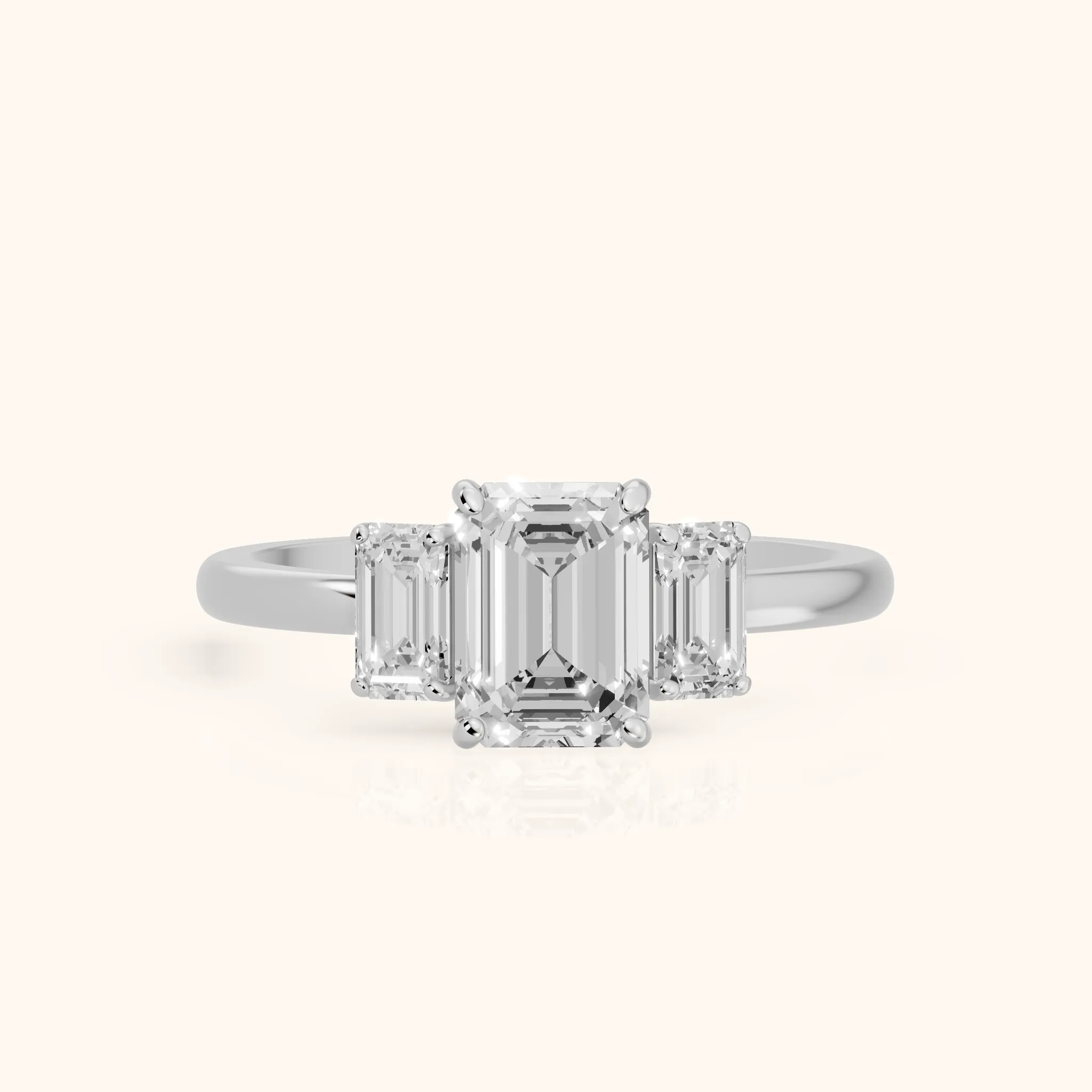 Marian Three-Stone Hidden Halo Emerald Diamond Engagement Ring in Silver — view 1
