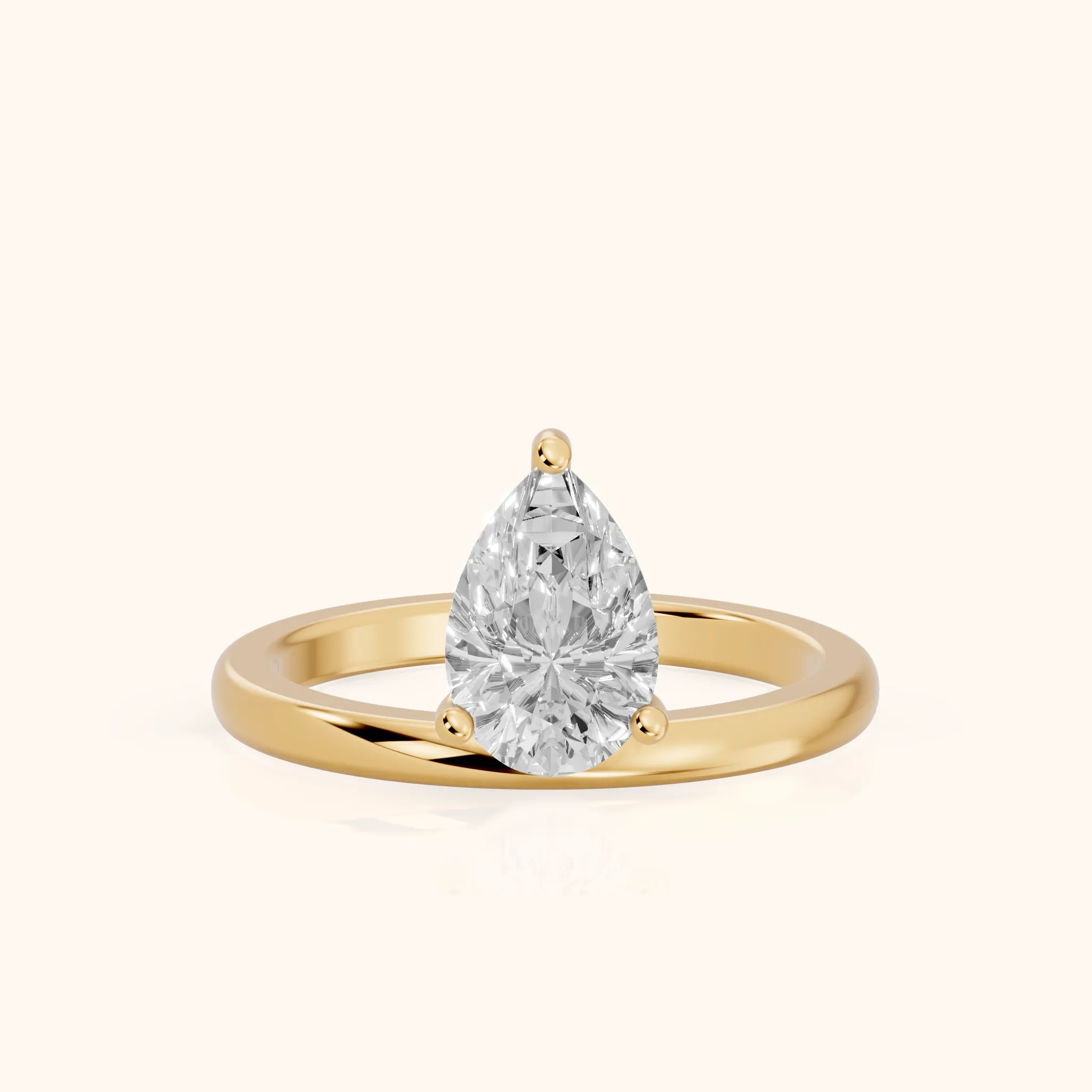 Maisie Four Prong Solitaire Pear Diamond Engagement Ring in Yellow Gold — view 1