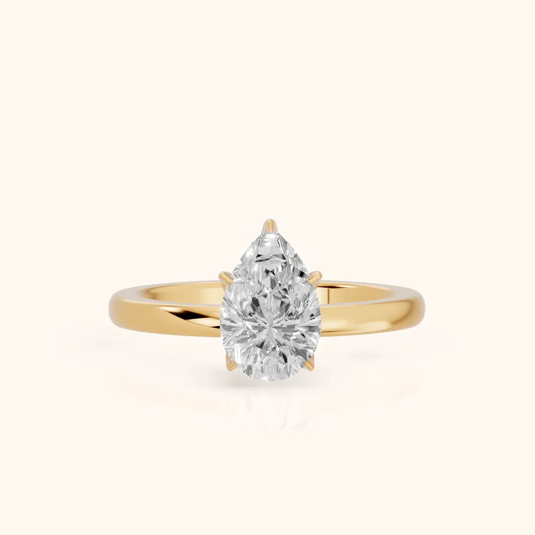Serena Blossom Solitaire Pear Diamond Engagement Ring in Yellow Gold