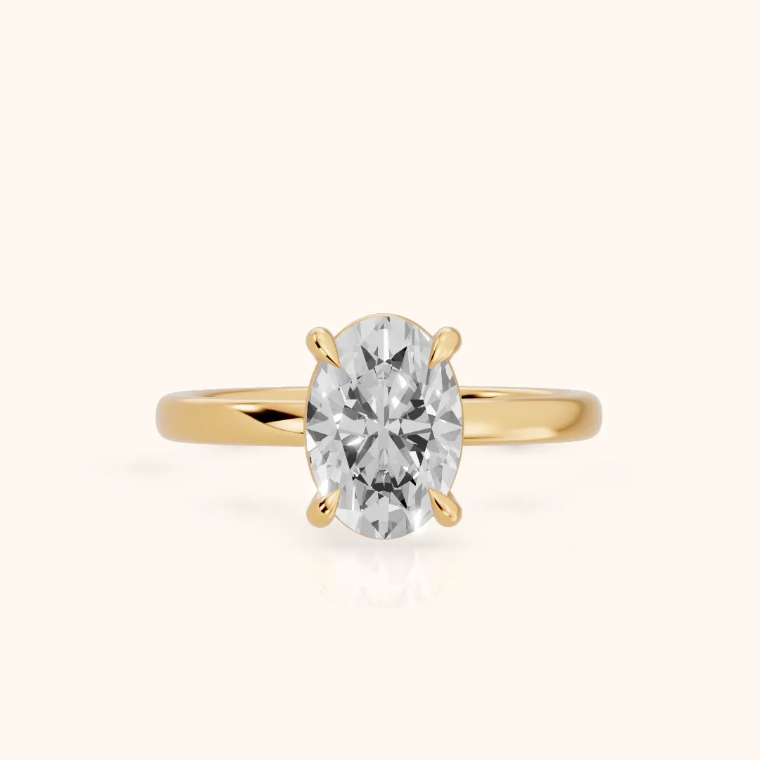 Cassandra Claw Prong Solitaire Oval Diamond Engagement Ring in Yellow Gold — view 2