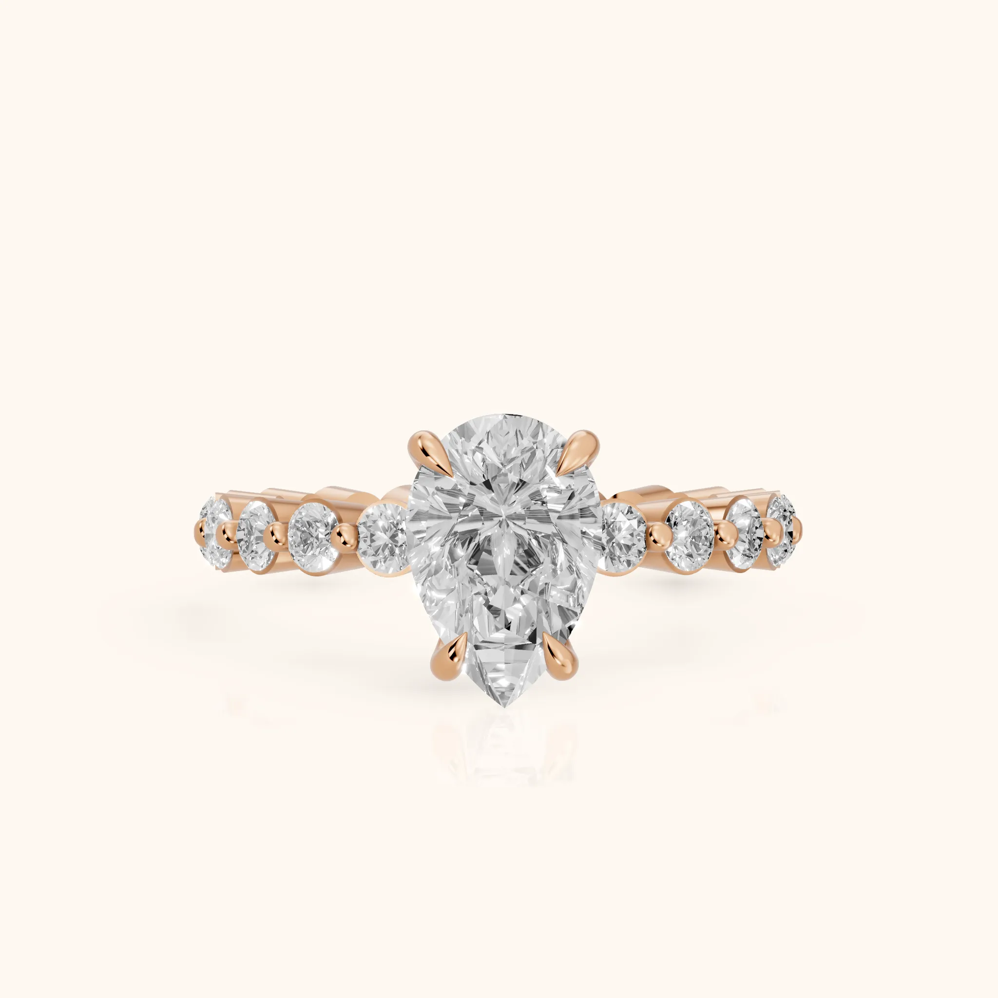 Piper Sidestone Pear Diamond Engagement Ring in Rose Gold — view 1