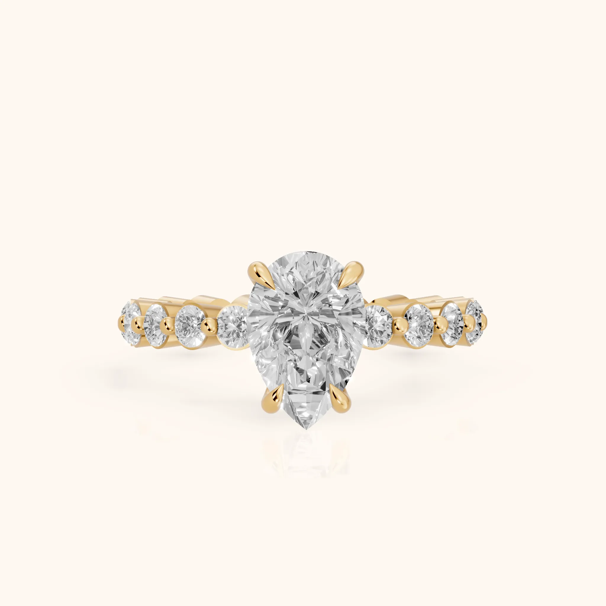 Piper Sidestone Pear Diamond Engagement Ring in Yellow Gold — view 1