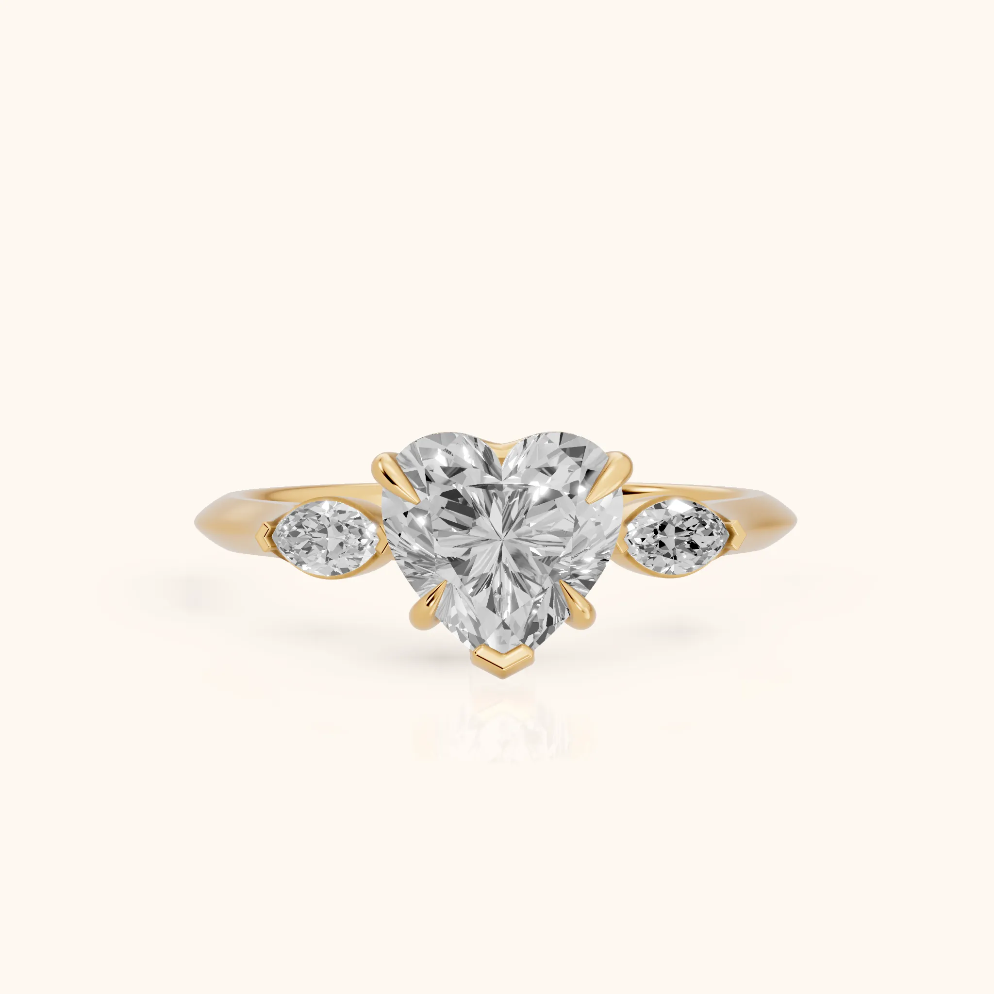 Lyra Three-Stone Heart Diamond Engagement Ring in Yellow Gold — view 1