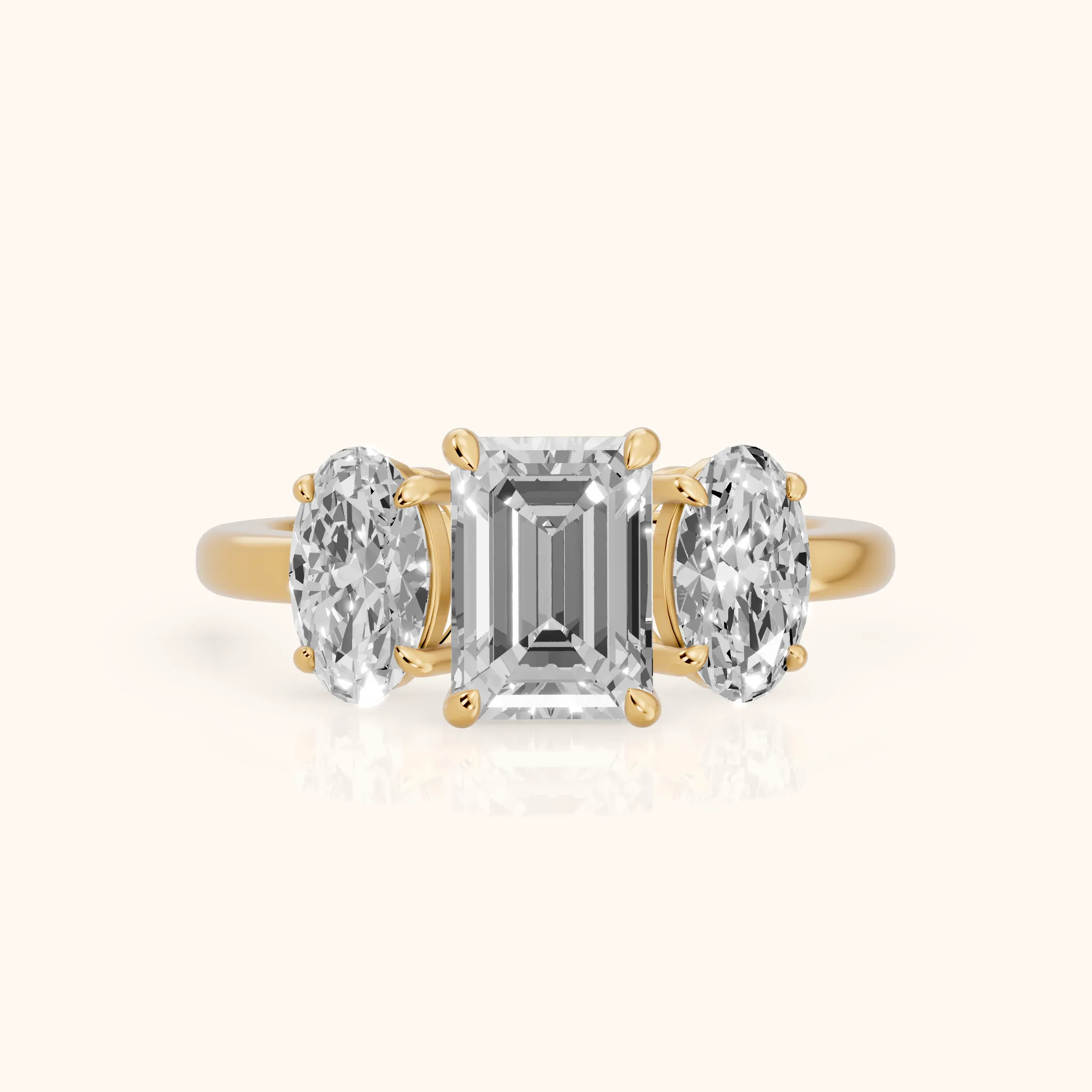 Lila Three-Stone Emerald Diamond Ring in Yellow Gold — view 1