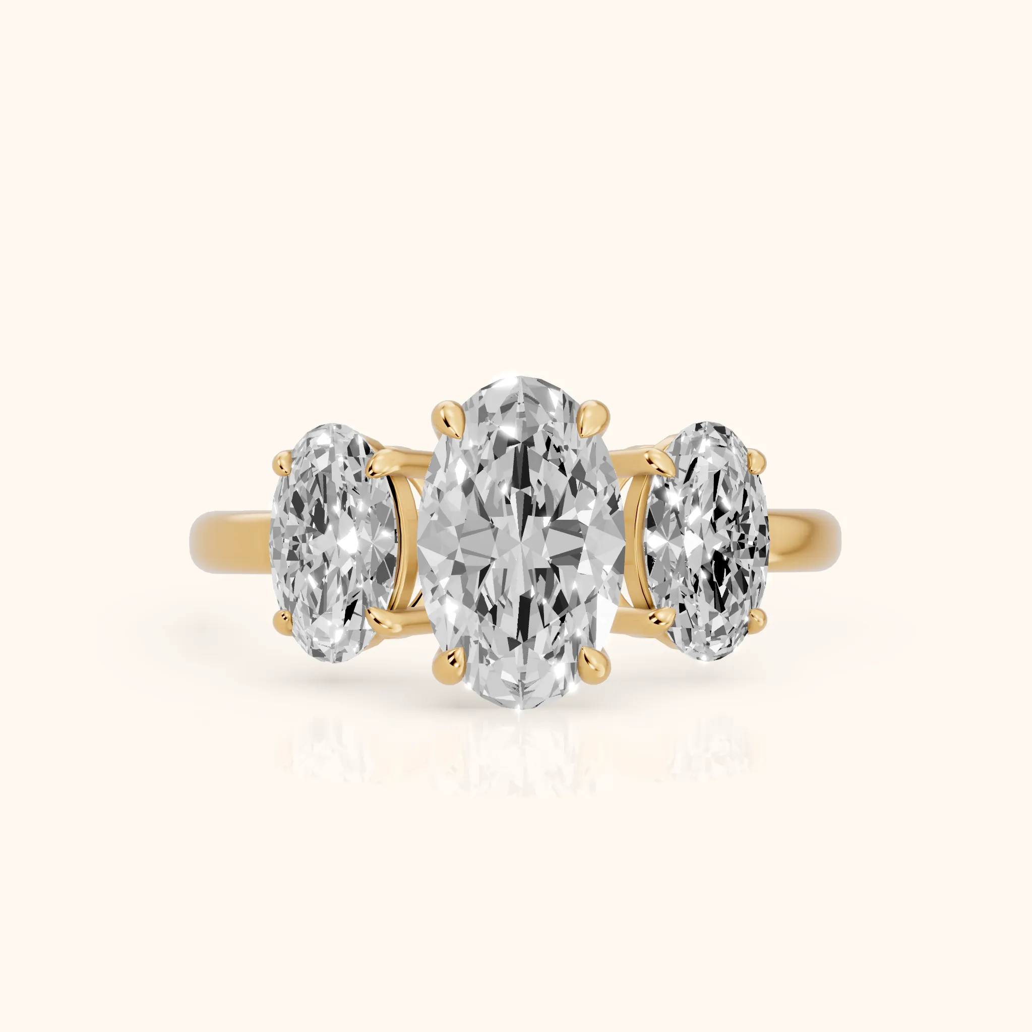 Lila Three-Stone Oval Diamond Ring in Yellow Gold — view 1