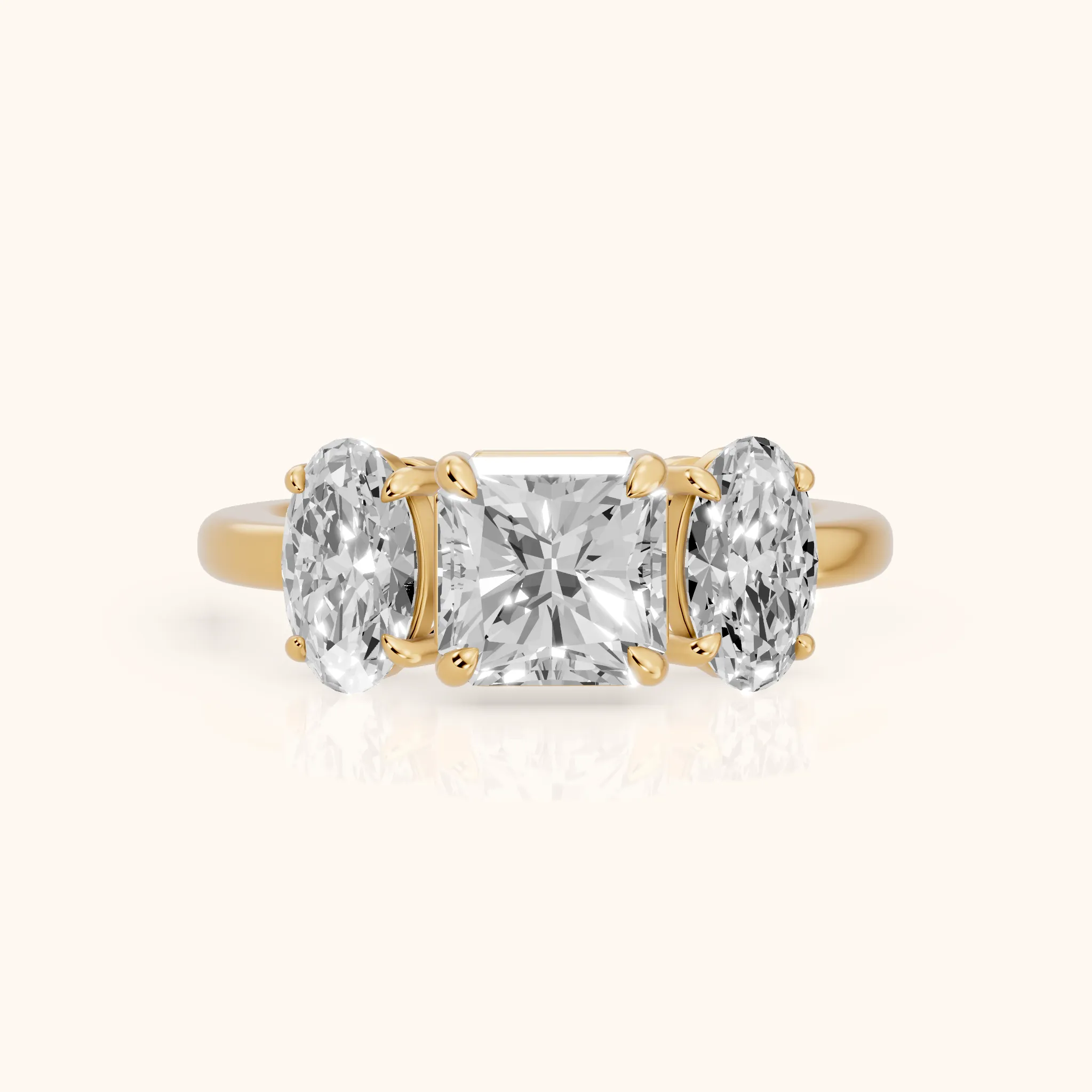 Lila Three-Stone Radiant Diamond Ring in Yellow Gold — view 1