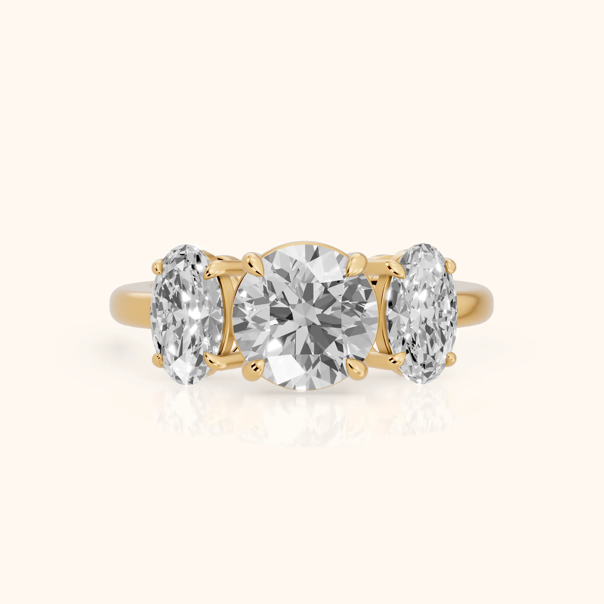 Lila Three-Stone Round Diamond Ring in Yellow Gold — view 1