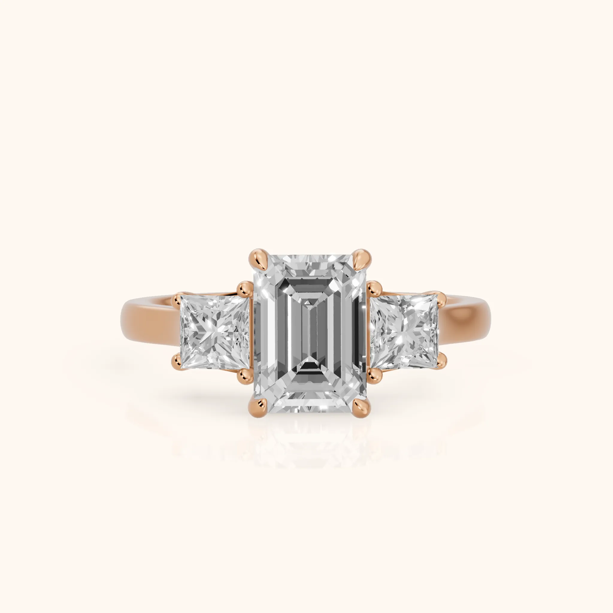Sienna Three-Stone Emerald Diamond Ring in Rose Gold — view 1