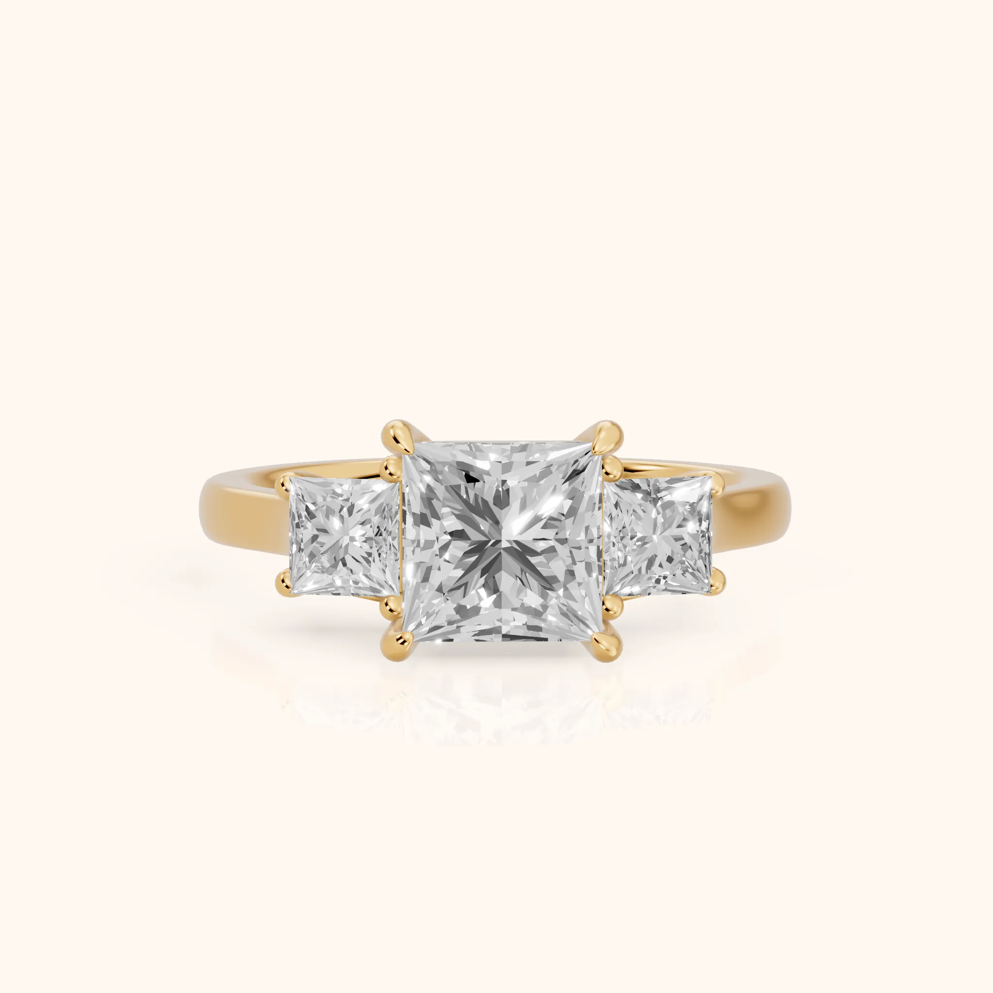 Sienna Three-Stone Princess Diamond Ring in Yellow Gold — view 1