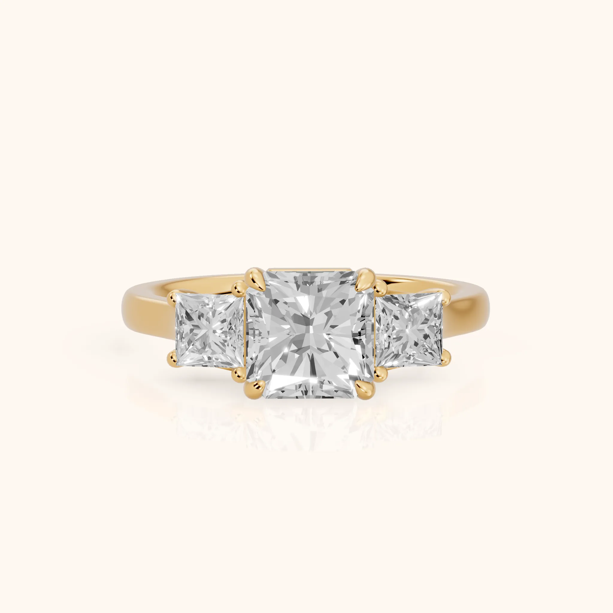 Sienna Three-Stone Radiant Diamond Ring in Yellow Gold — view 1