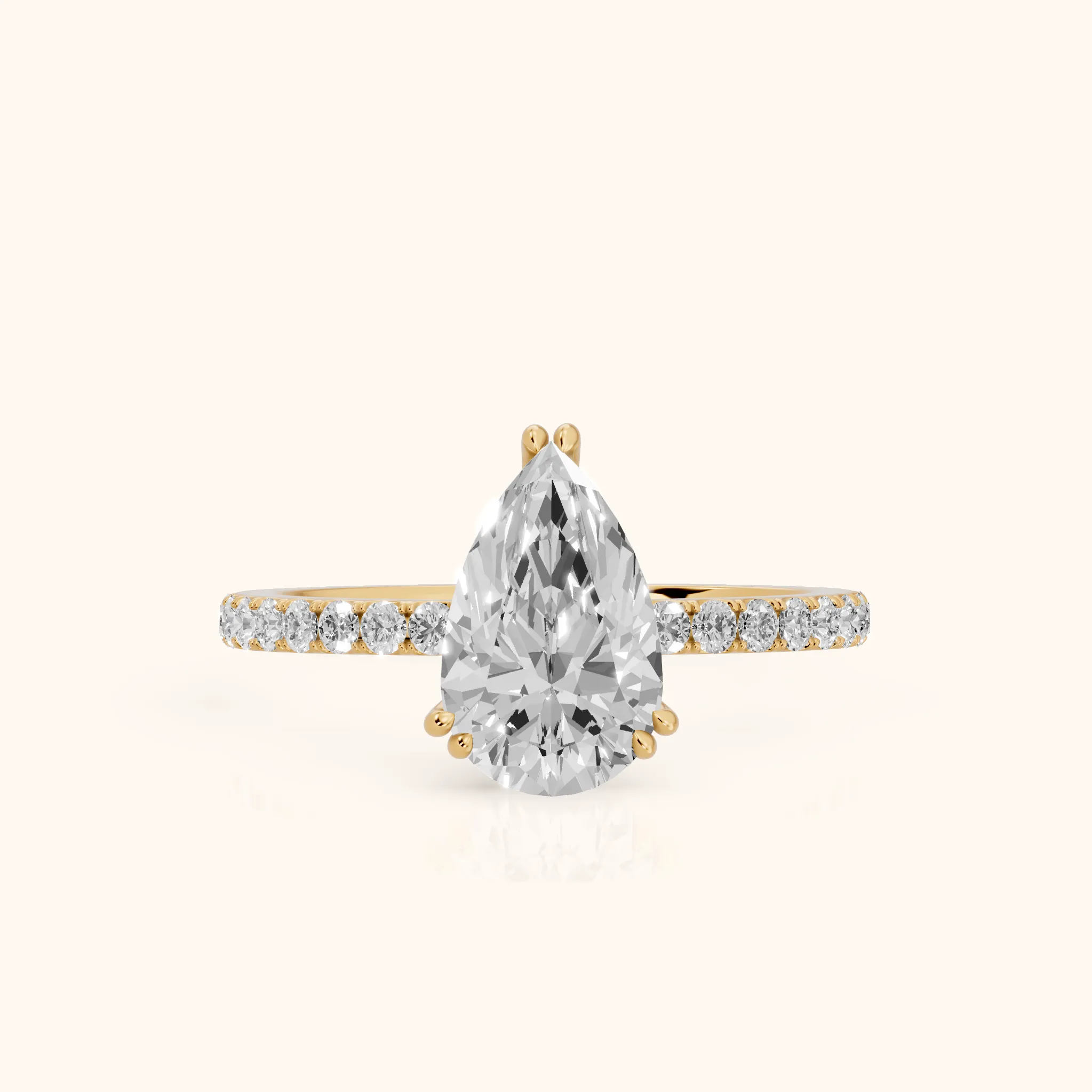 Novara Solitaire Pavé Pear Diamond Ring in Yellow Gold — view 1