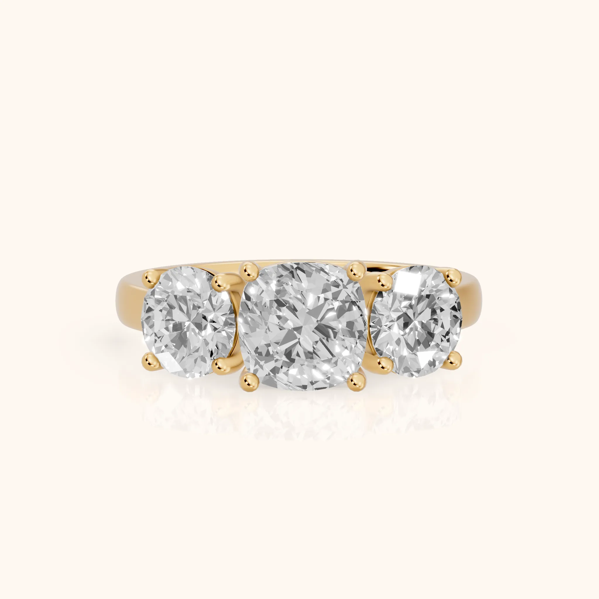 Esme Three-Stone Tapered Cushion Diamond Ring in Yellow Gold — view 1