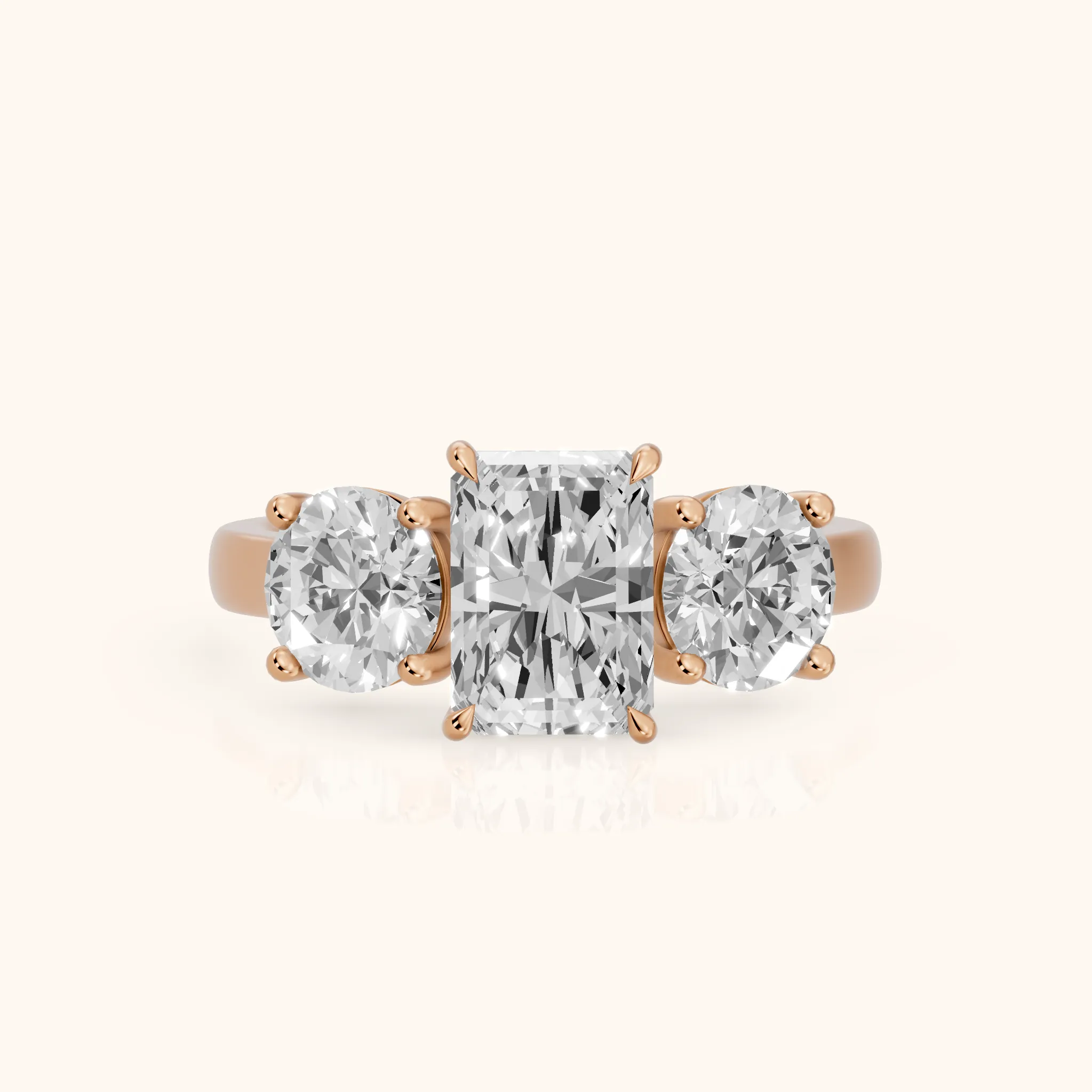 Esme Three-Stone Tapered Emerald Diamond Ring in Rose Gold — view 1