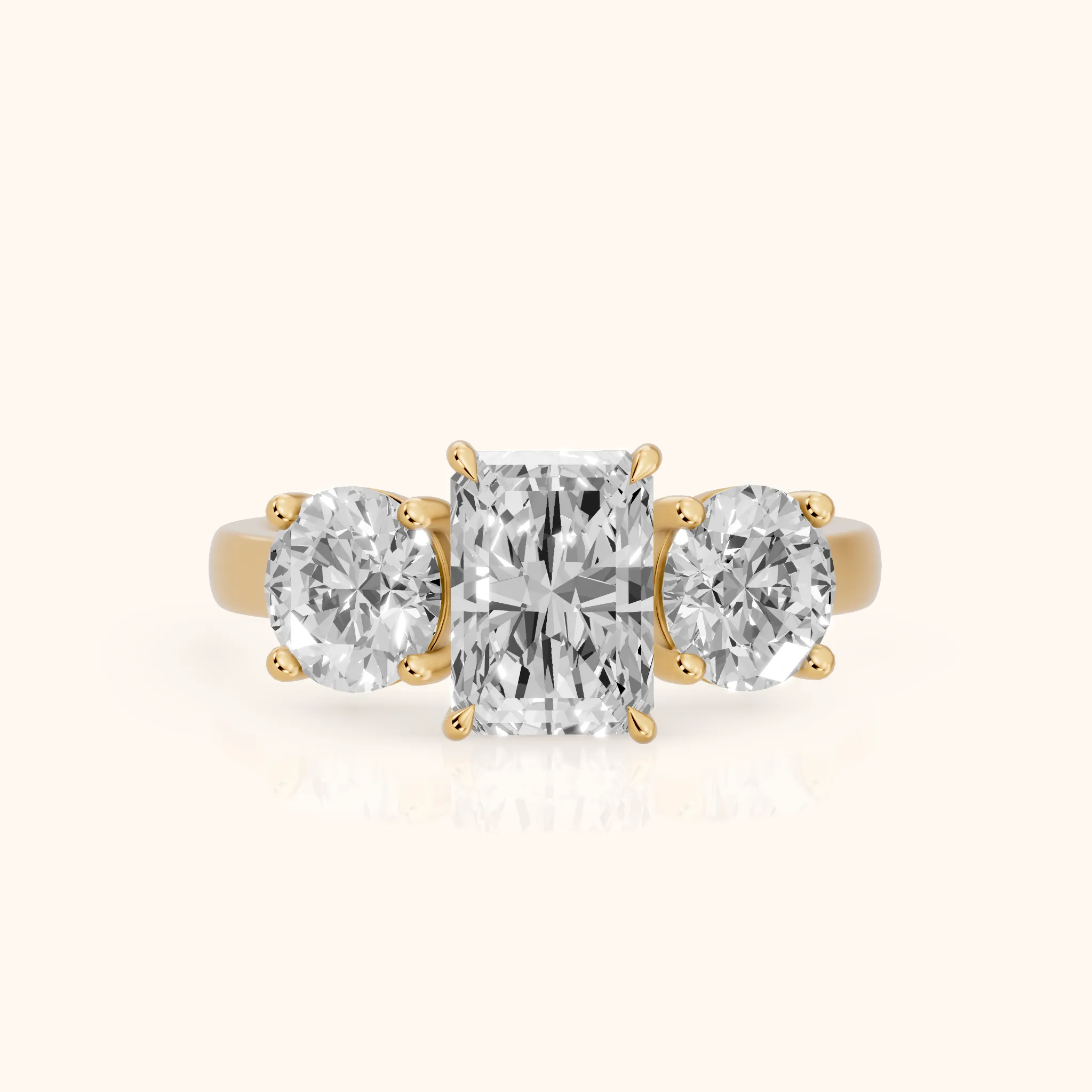 Esme Three-Stone Tapered Emerald Diamond Ring in Yellow Gold — view 1