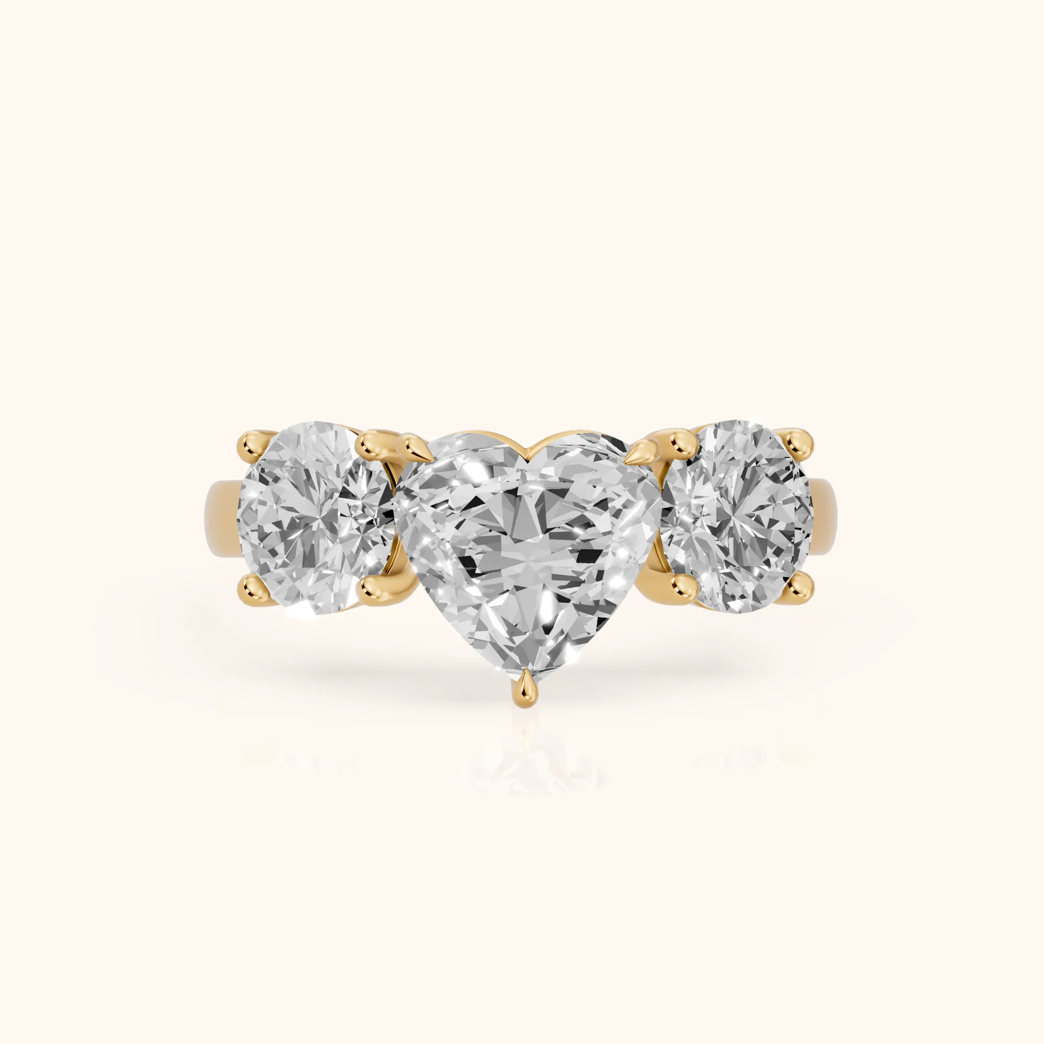 Esme Three-Stone Tapered Heart Diamond Ring in Yellow Gold — view 1