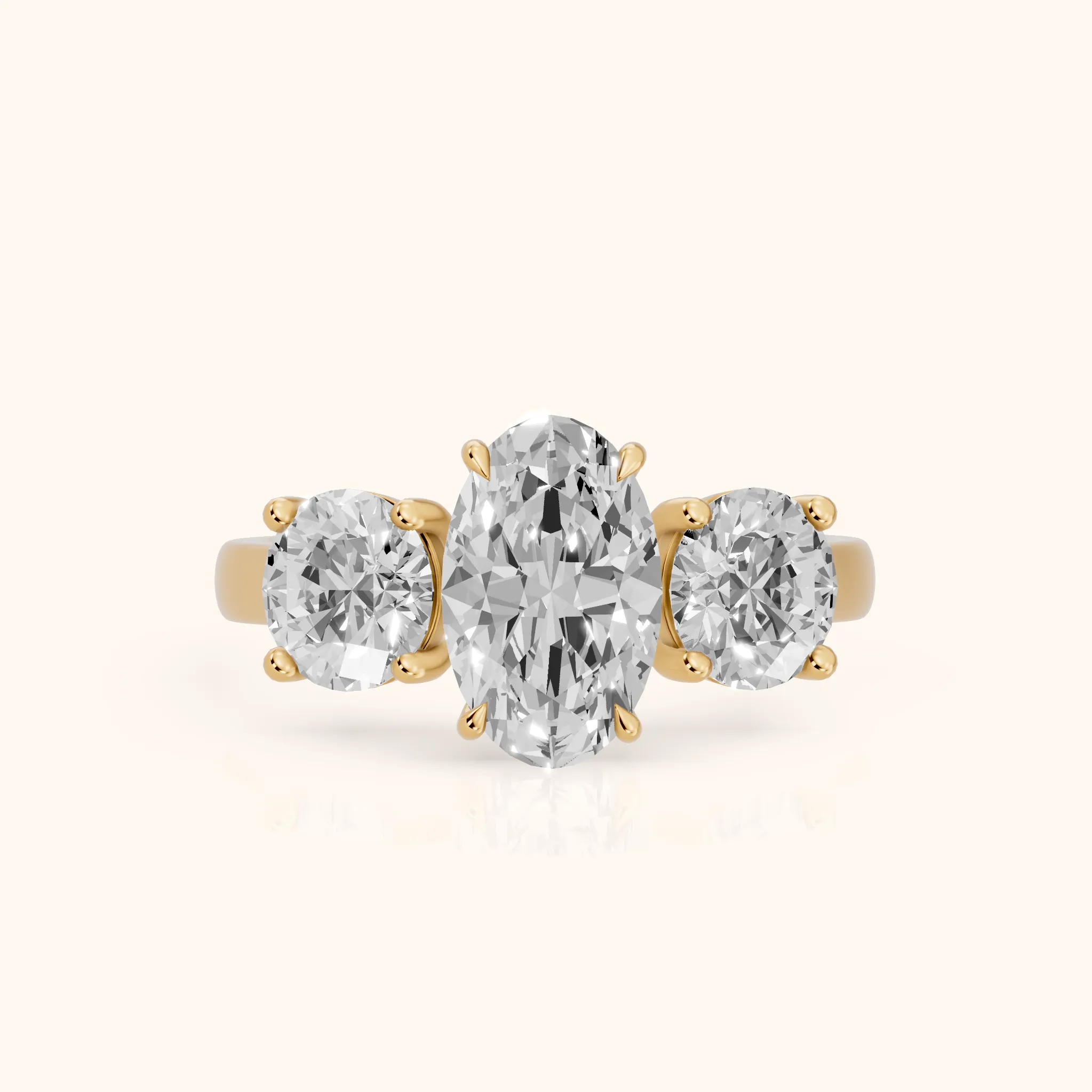 Esme Three-Stone Tapered Oval Diamond Ring in Yellow Gold — view 1
