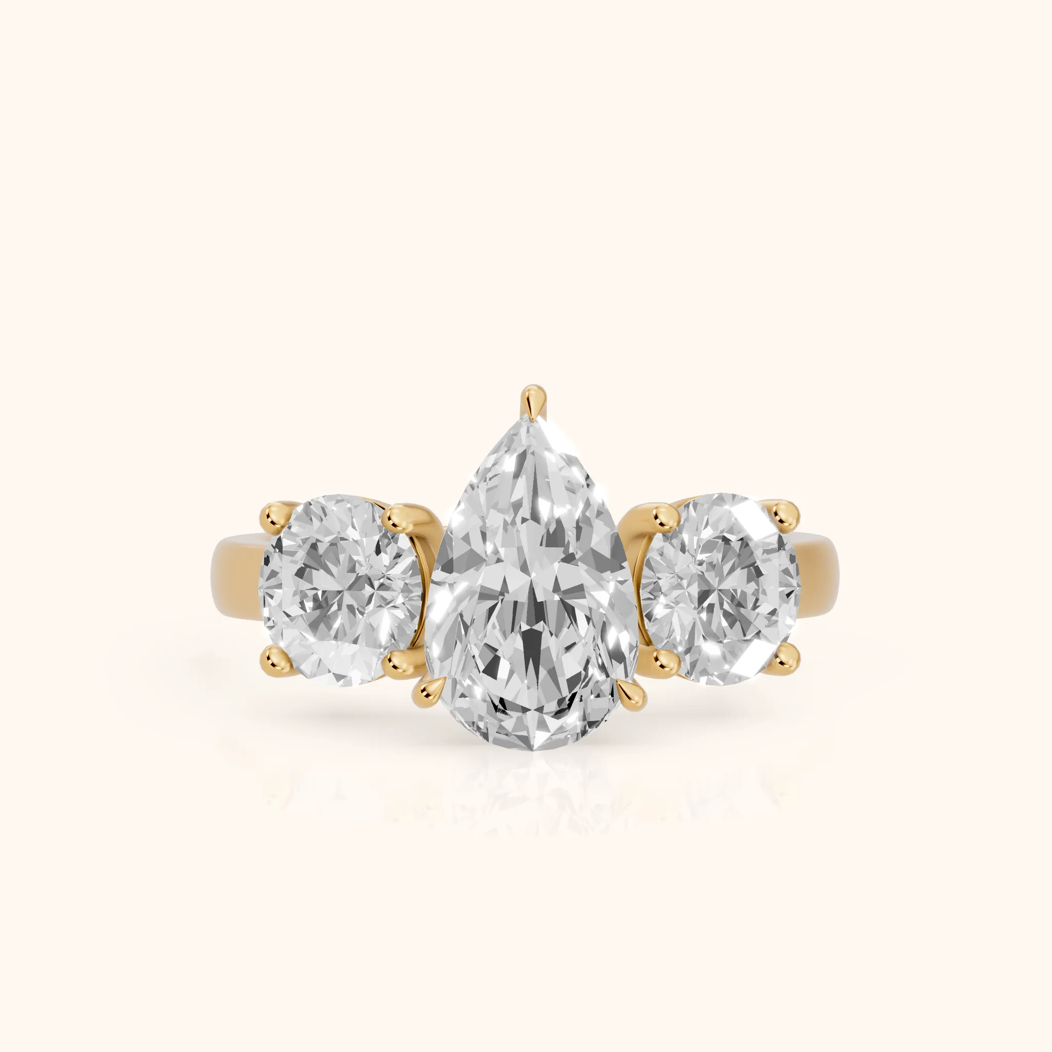 Esme Three-Stone Tapered Pear Diamond Ring in Yellow Gold — view 1