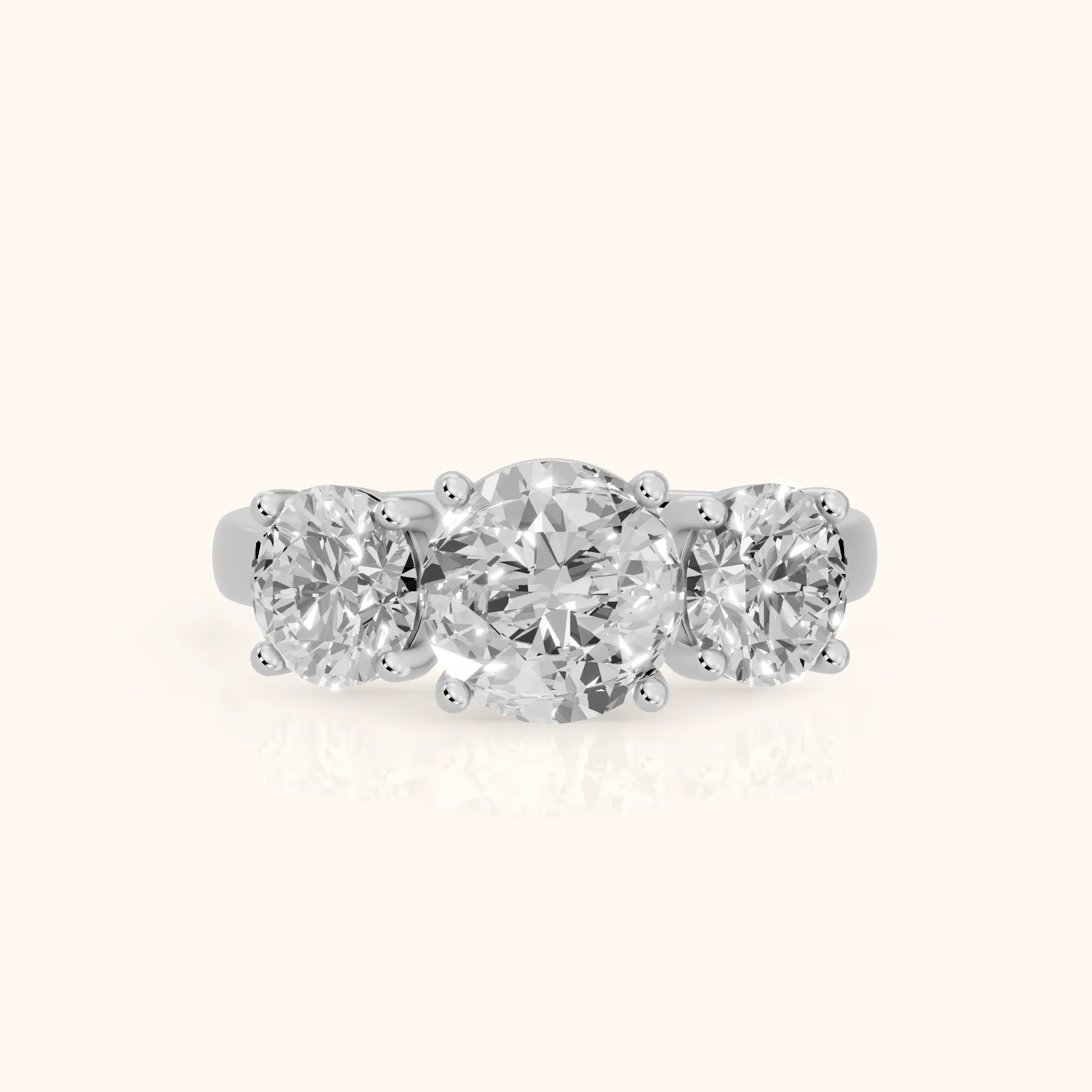 Esme Three-Stone Tapered Round Diamond Ring in Platinum — view 1