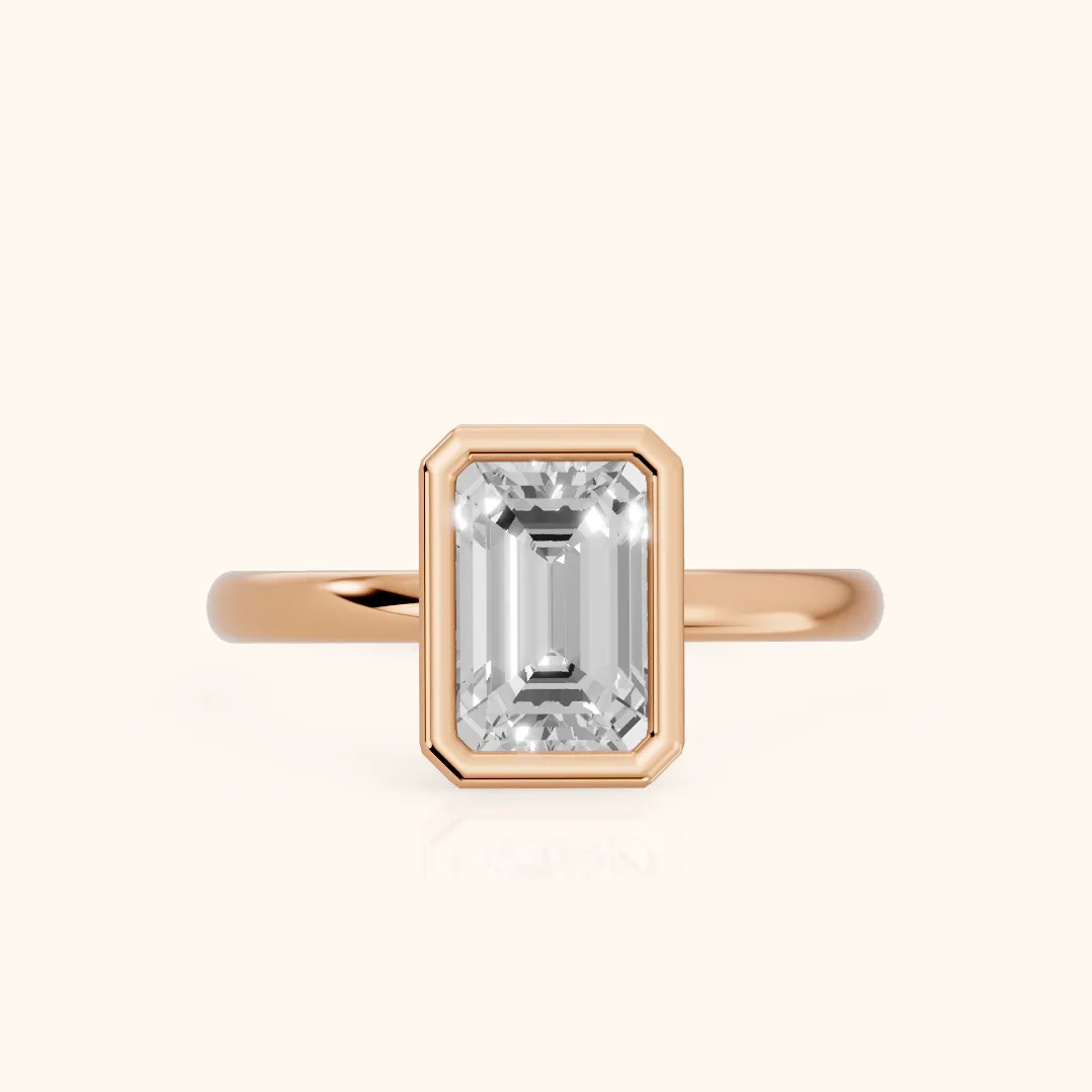 Maeve Bezel Solitaire Emerald Diamond Ring in Rose Gold — view 2