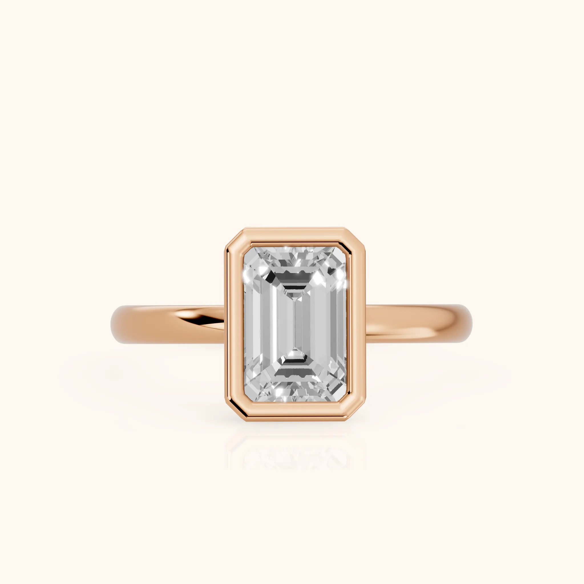 Maeve Bezel Solitaire Emerald Diamond Ring in Rose Gold — view 1