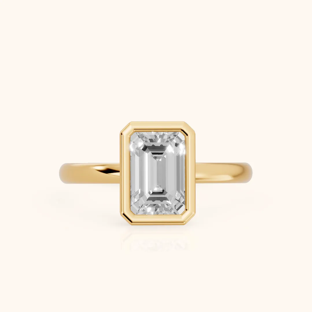 Maeve Bezel Solitaire Emerald Diamond Ring in Yellow Gold — view 2