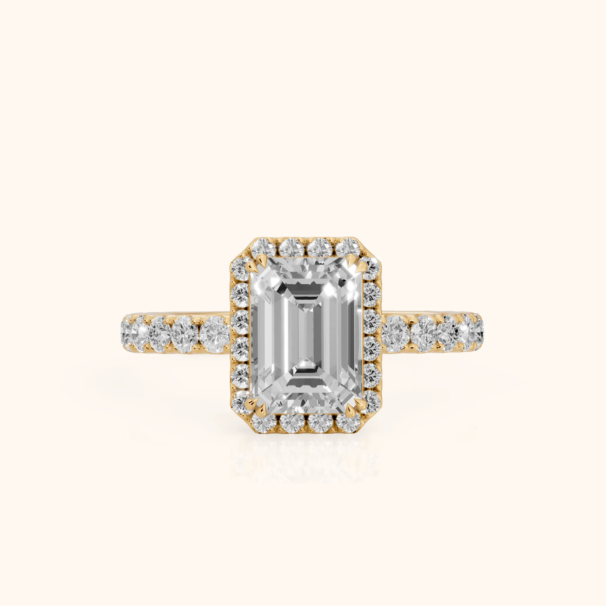 Chloe Halo Pavé Emerald Diamond Ring in Yellow Gold — view 1