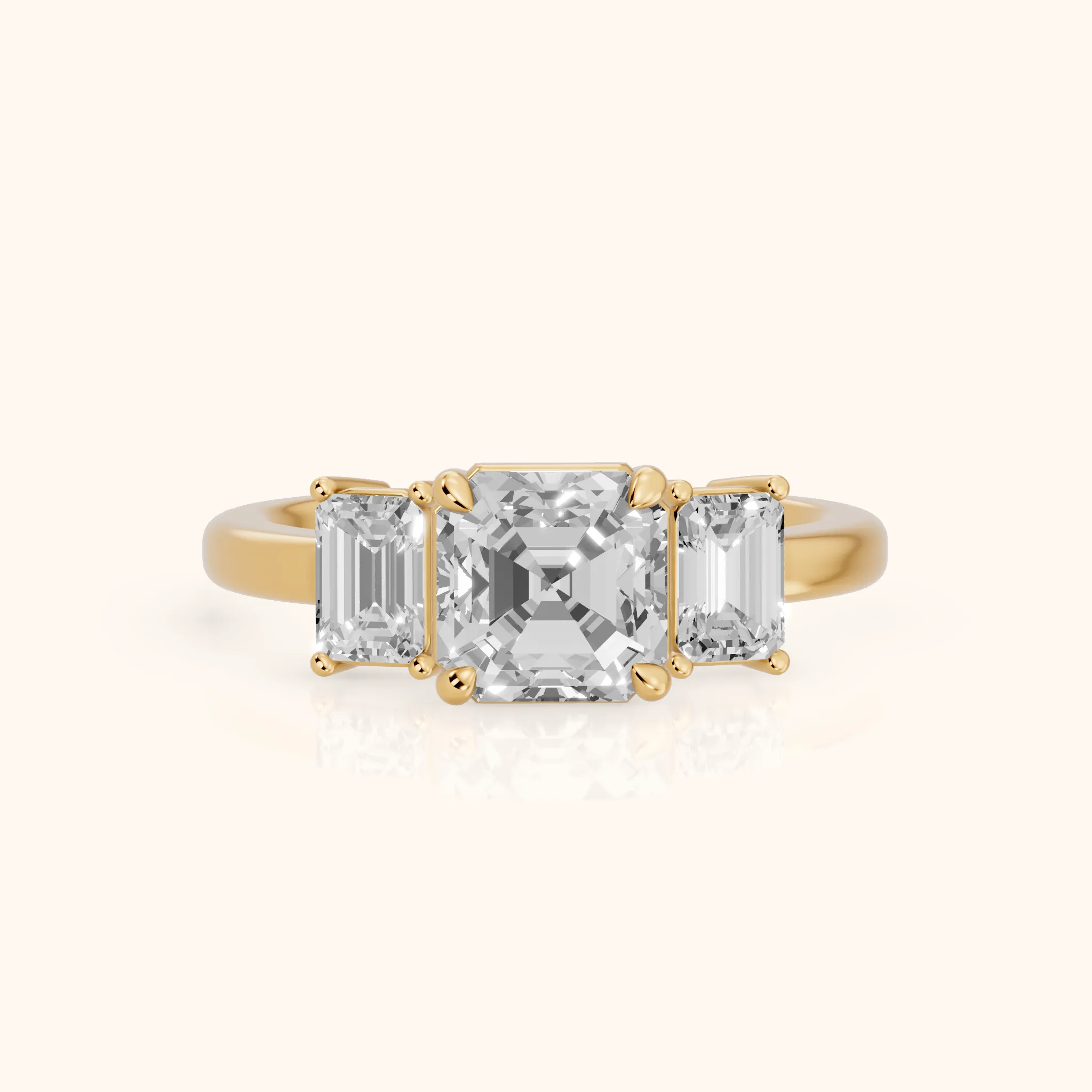 Zoe Three-Stone Asscher Diamond Ring in Yellow Gold — view 1