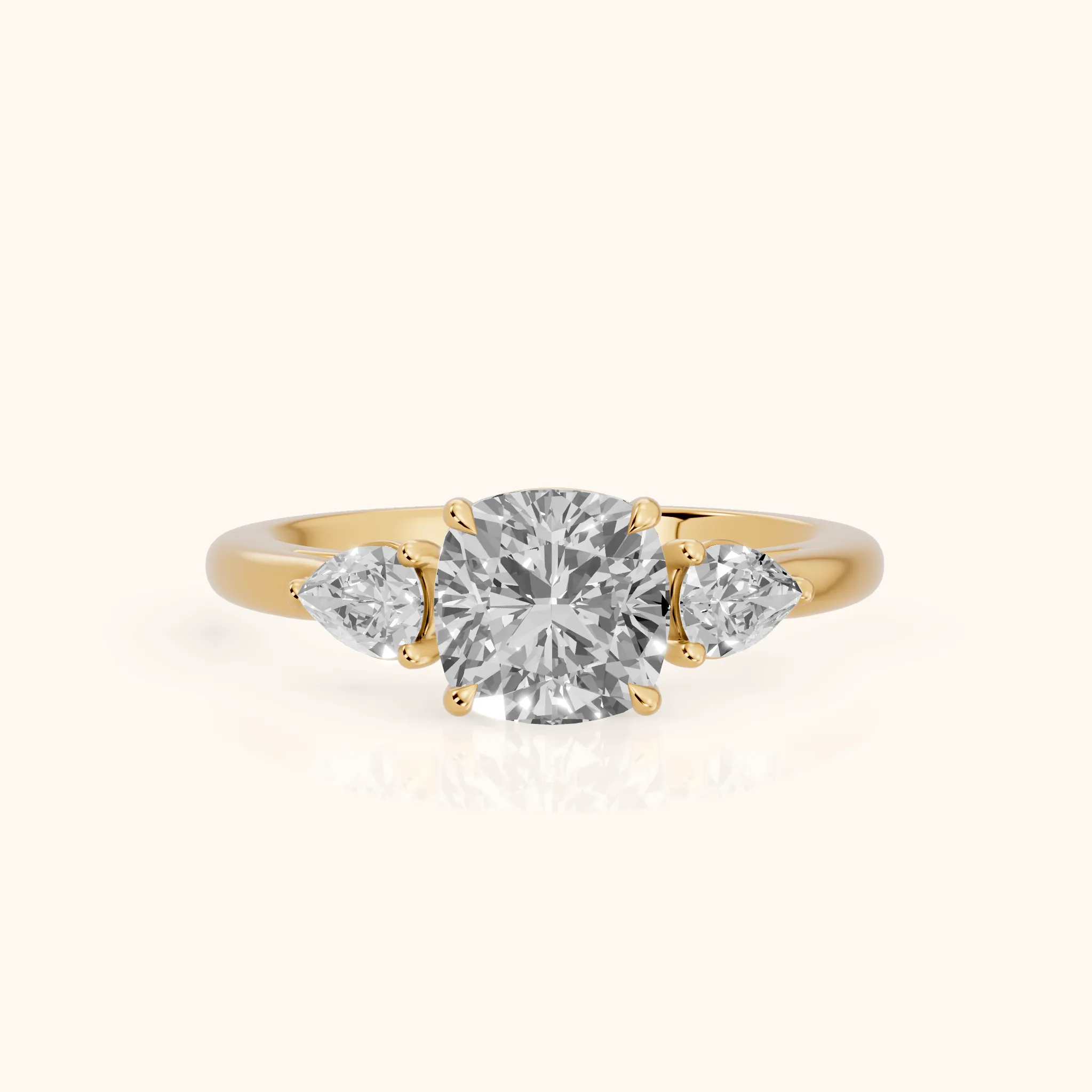 Phoebe Three-Stone Cushion Diamond Ring in Yellow Gold — view 1