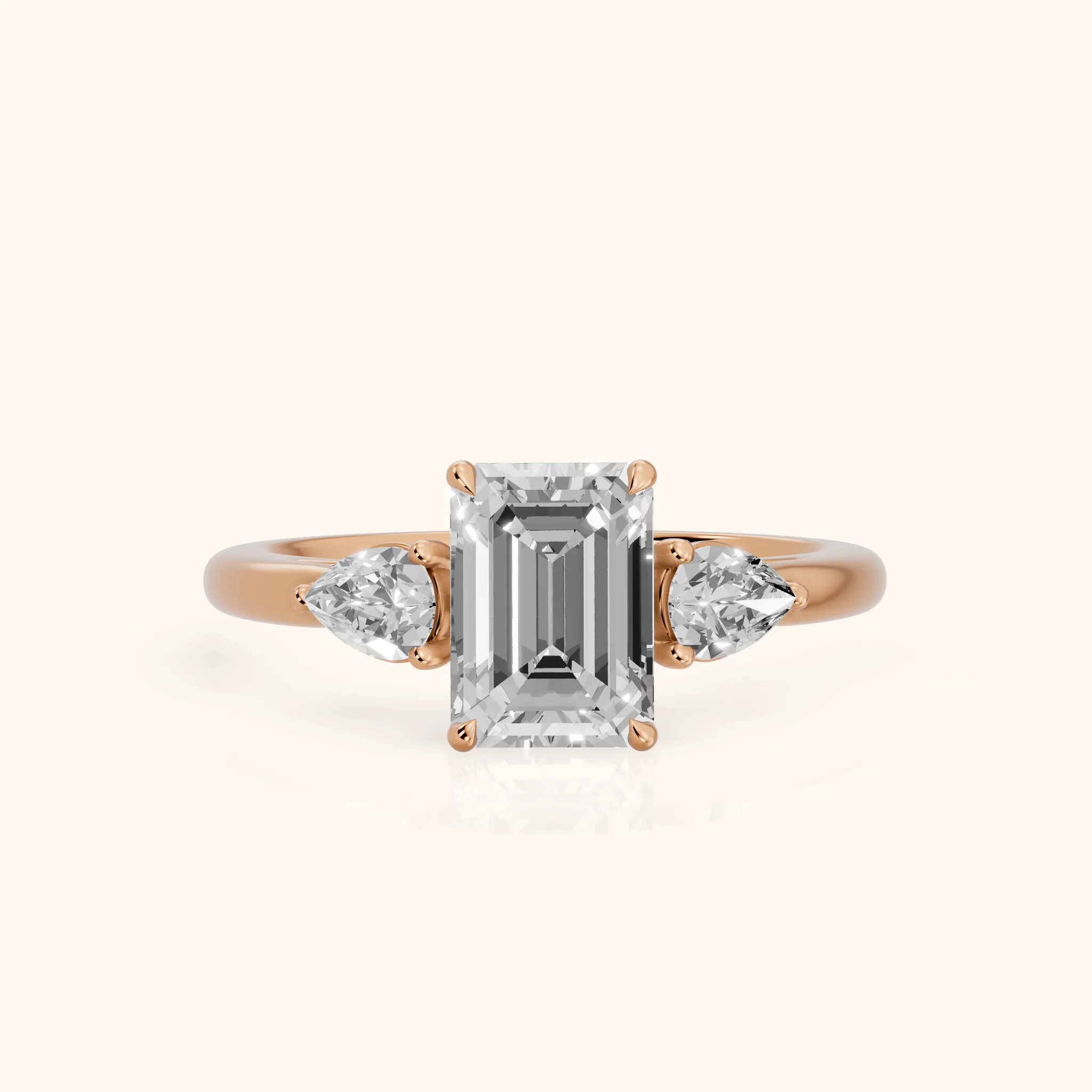 Phoebe Three-Stone Emerald Diamond Ring in Rose Gold — view 1